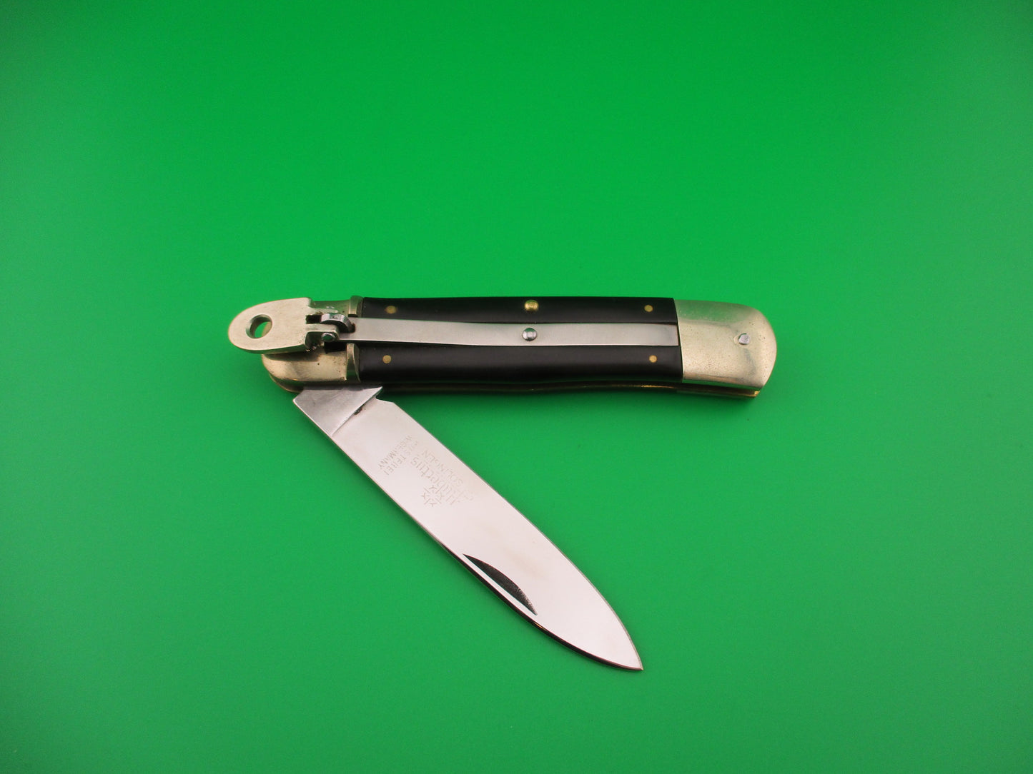 Hubertus Solingen 11cm West Germany Lever Black Micarta automatic knife