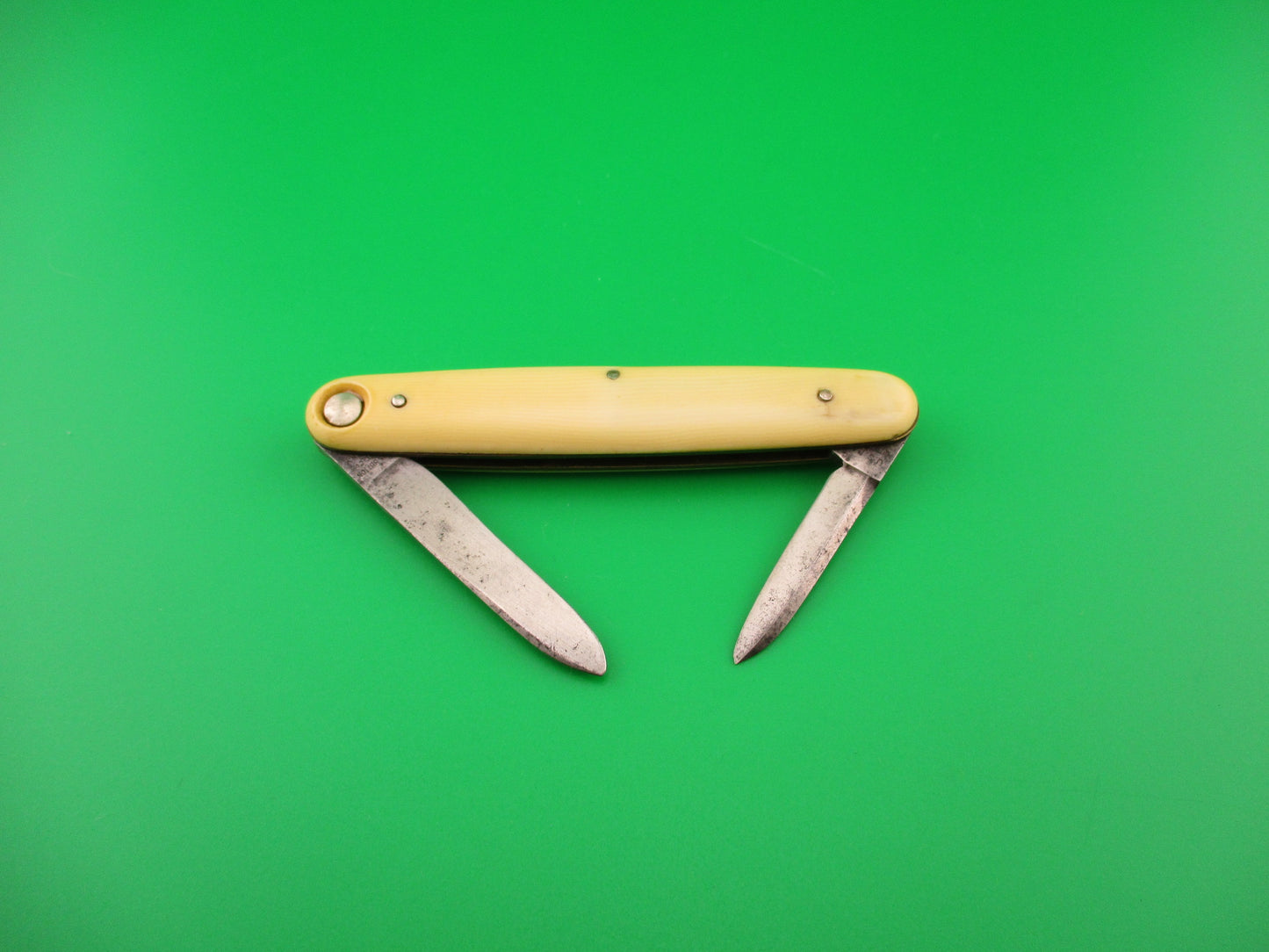 PRESS BUTTON KNIFE CO WALDEN, NY Medium double Ivory Cell switchblade knife