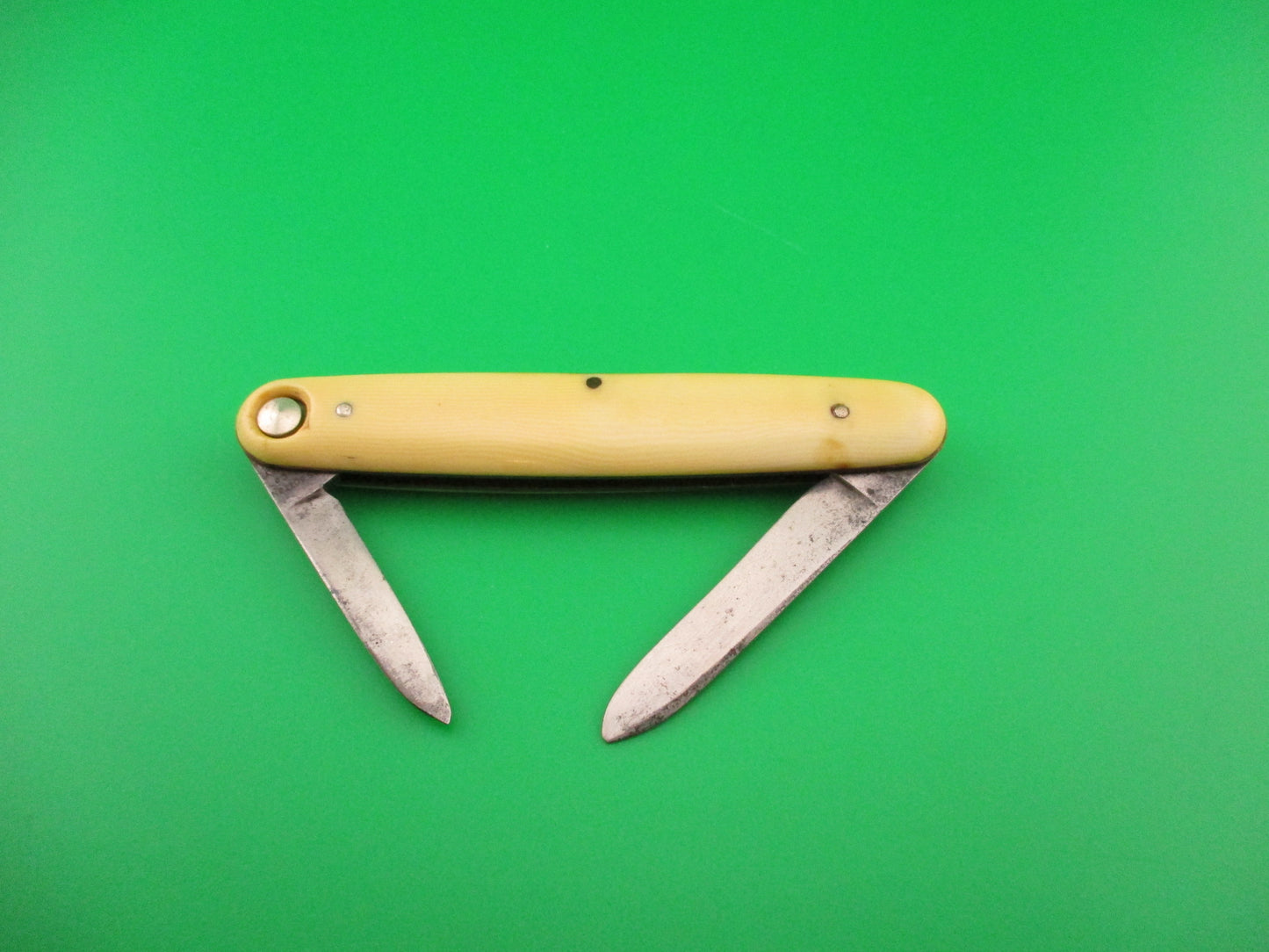 PRESS BUTTON KNIFE CO WALDEN, NY Medium double Ivory Cell switchblade knife