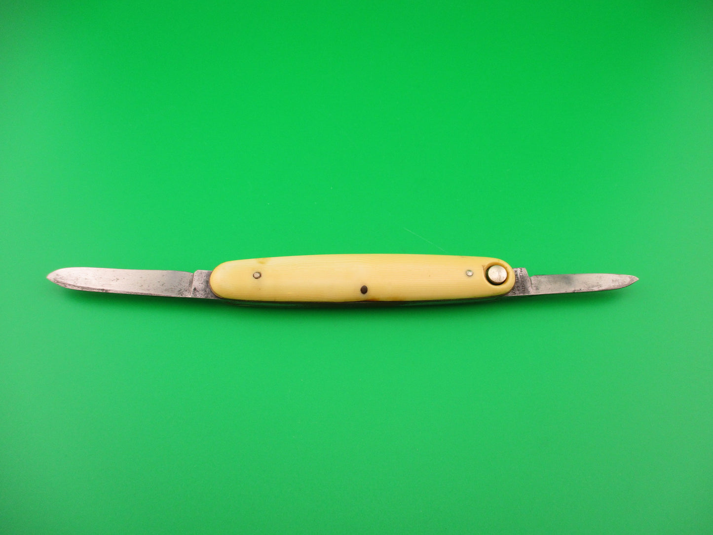 PRESS BUTTON KNIFE CO WALDEN, NY Medium double Ivory Cell switchblade knife