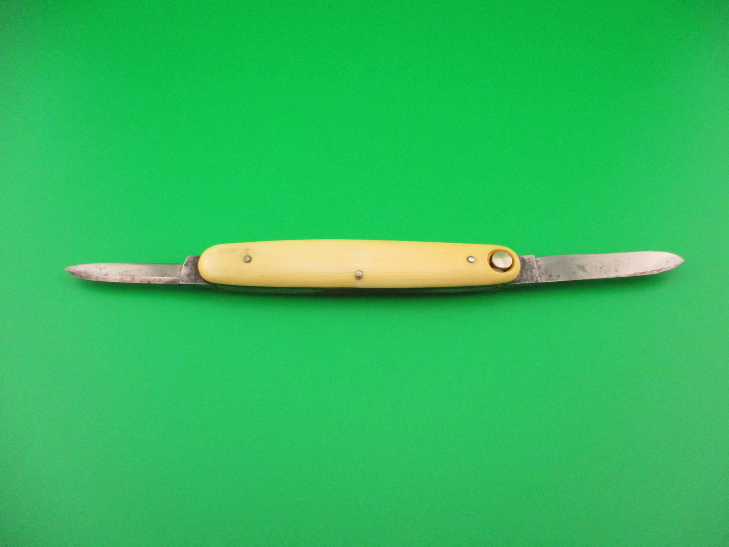 PRESS BUTTON KNIFE CO WALDEN, NY Medium double Ivory Cell switchblade knife