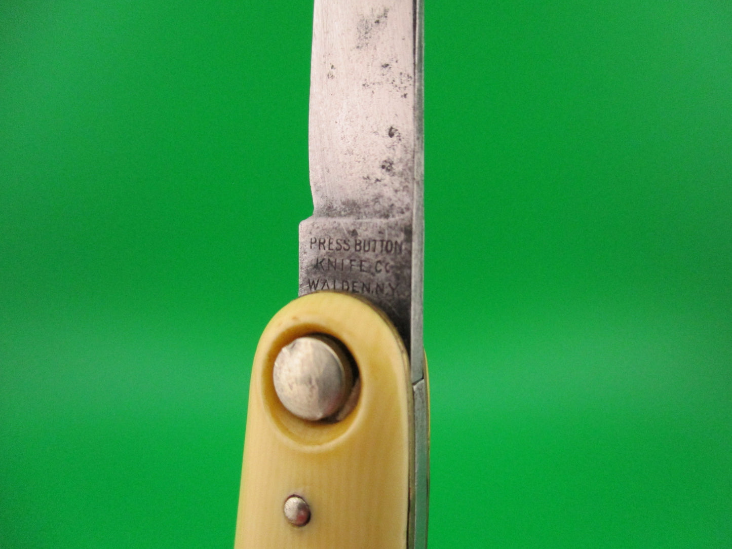 PRESS BUTTON KNIFE CO WALDEN, NY Medium double Ivory Cell switchblade knife