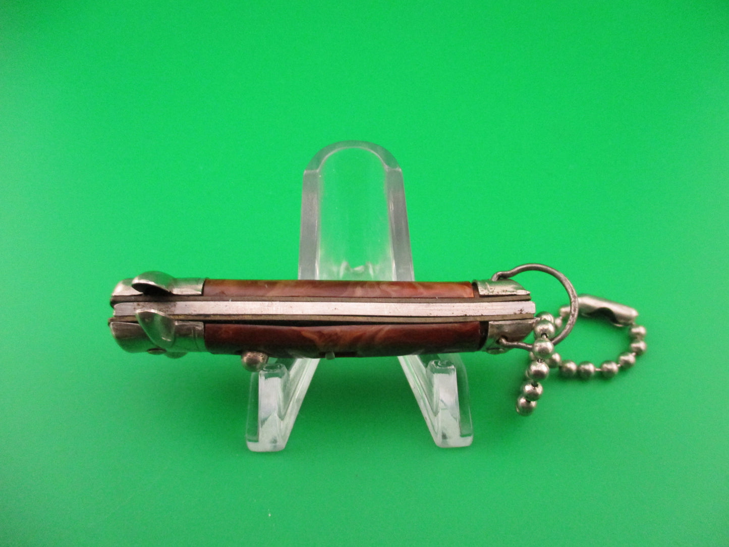 Colonial Snappy Vintage 2nd Gen 1950s Rootbeer bowtie keychain switchblade knife NM