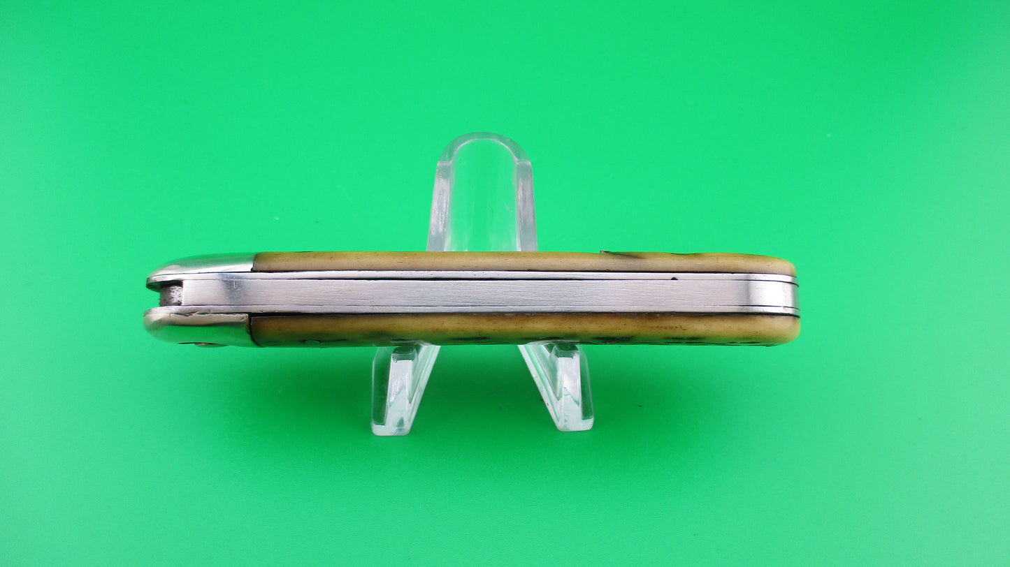 z Press Button Knife Co Business Clip blade picked bone switchblade knife