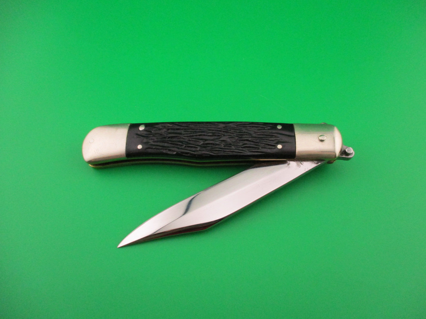 KABAR Lever Black Jigged synthetic Transitional Square lever vintage automatic knife