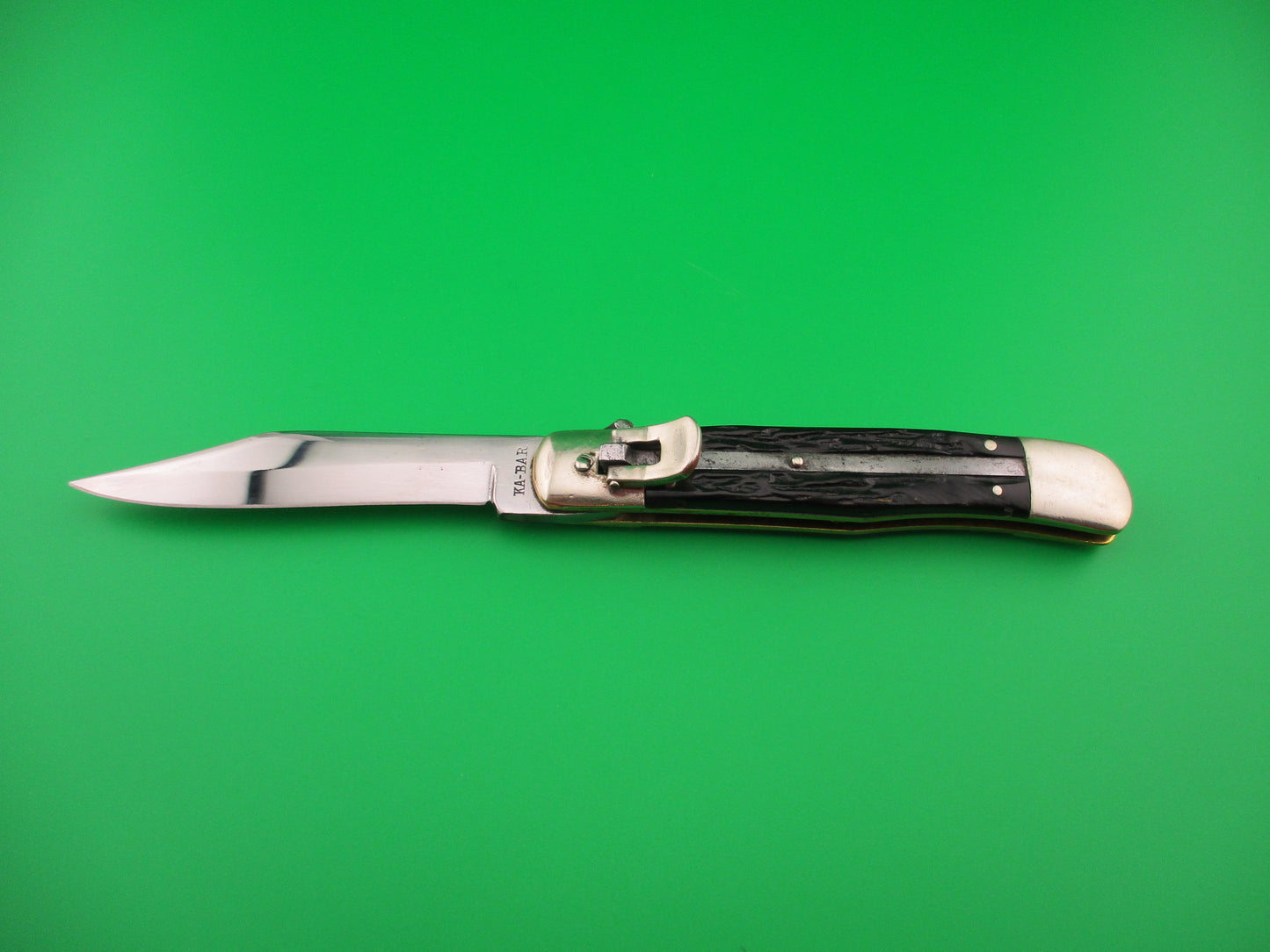 KABAR Lever Black Jigged synthetic Transitional Square lever vintage automatic knife