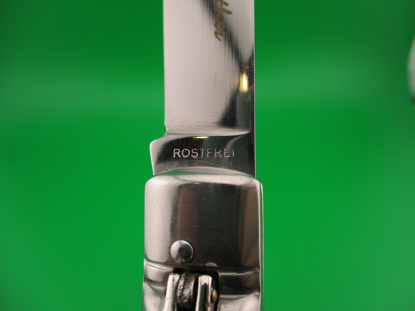 ROSTFREI Panther 20cm Italian Birds head lever automatic knife w green horn