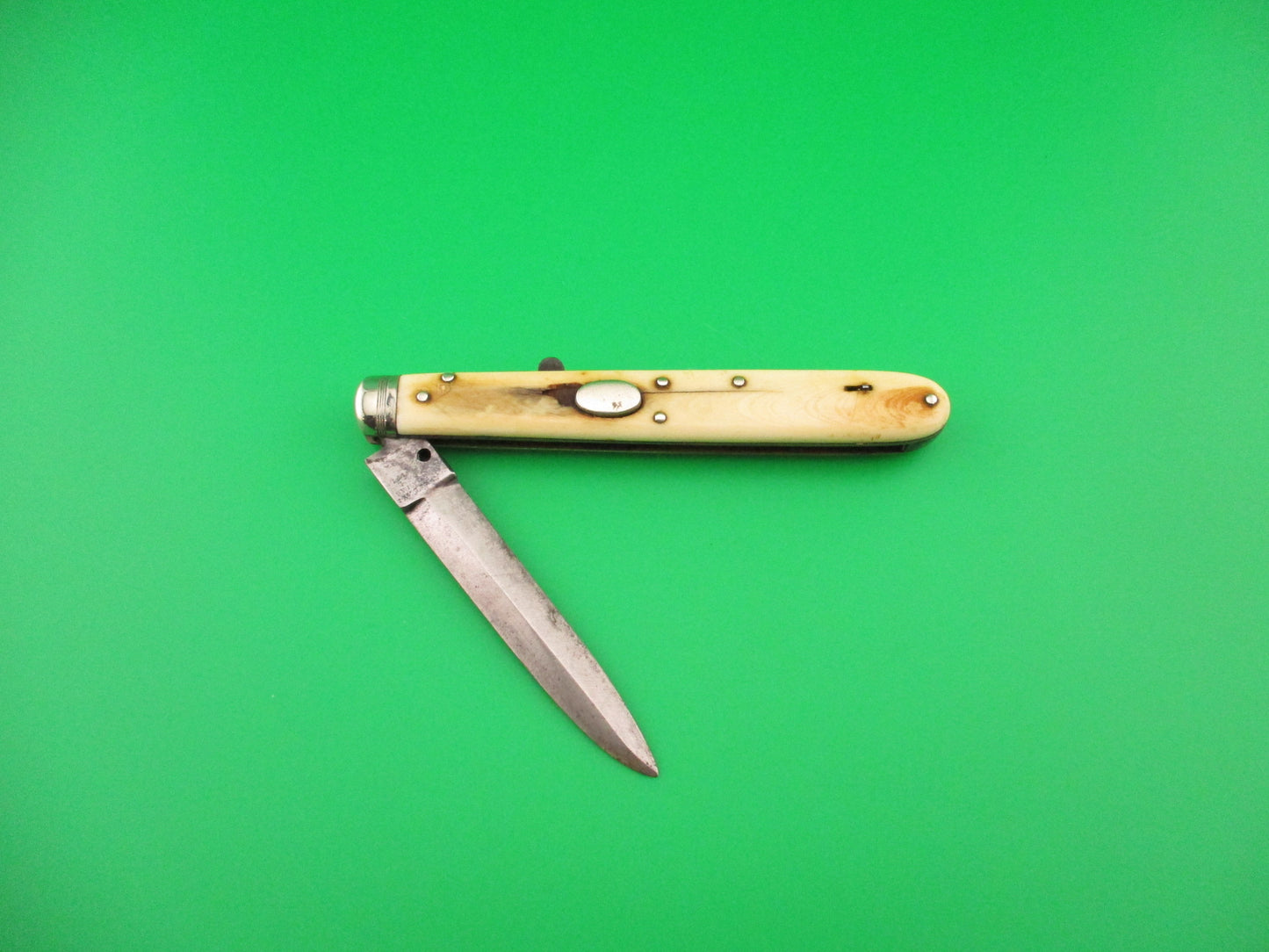 PICKSLAY'S PERUVIAN STEEL SHEFFIELD 19th Century English Oval button Automatic knife