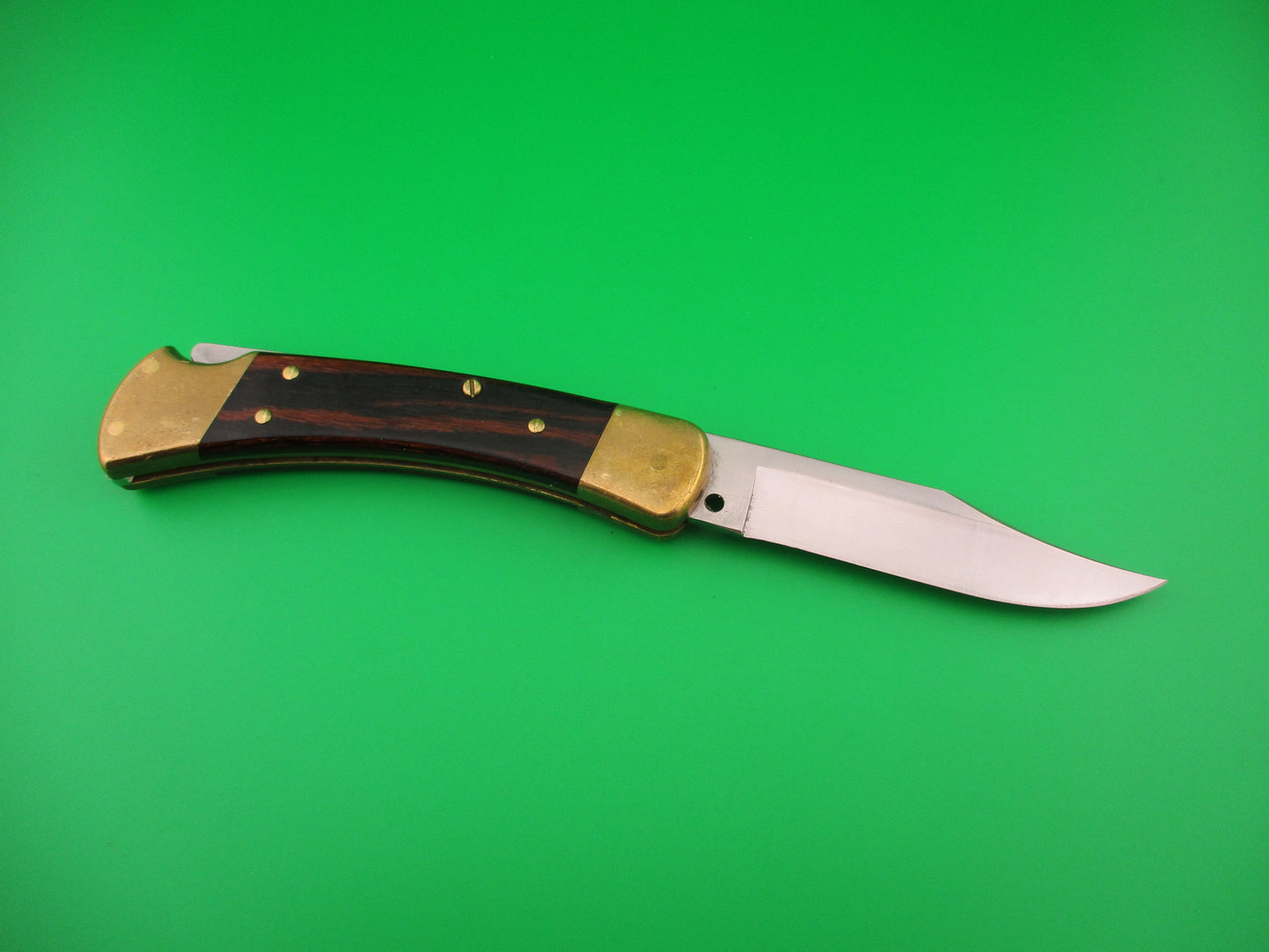 BUCK USA 110 Converted SA Wood Brass 100th Anniversary lockback automatic knife