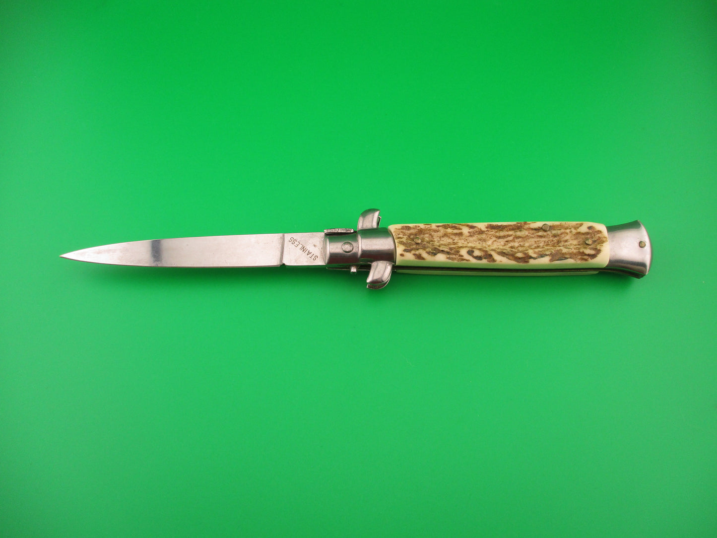 STAINLESS (slant) UD96A000103 PATENT 23cm Italian Stiletto bolster release switchblade
