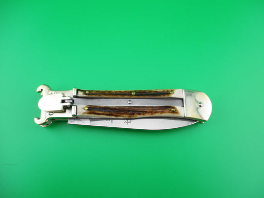 z Hubertus 11cm German Stag Shellpuller Otter automatic knife New in box.