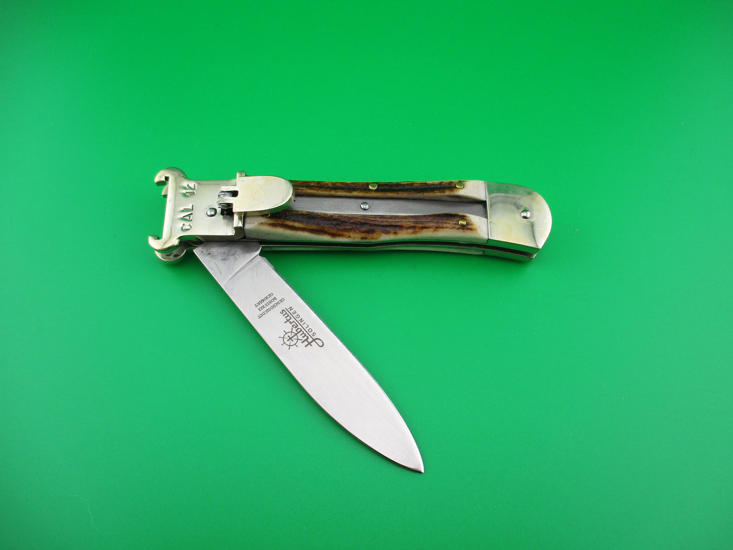 z Hubertus 11cm German Stag Shellpuller Otter automatic knife New in box.