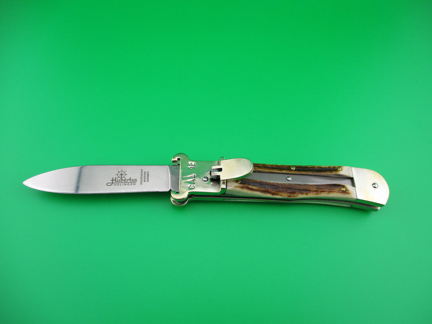 z Hubertus 11cm German Stag Shellpuller Otter automatic knife New in box.