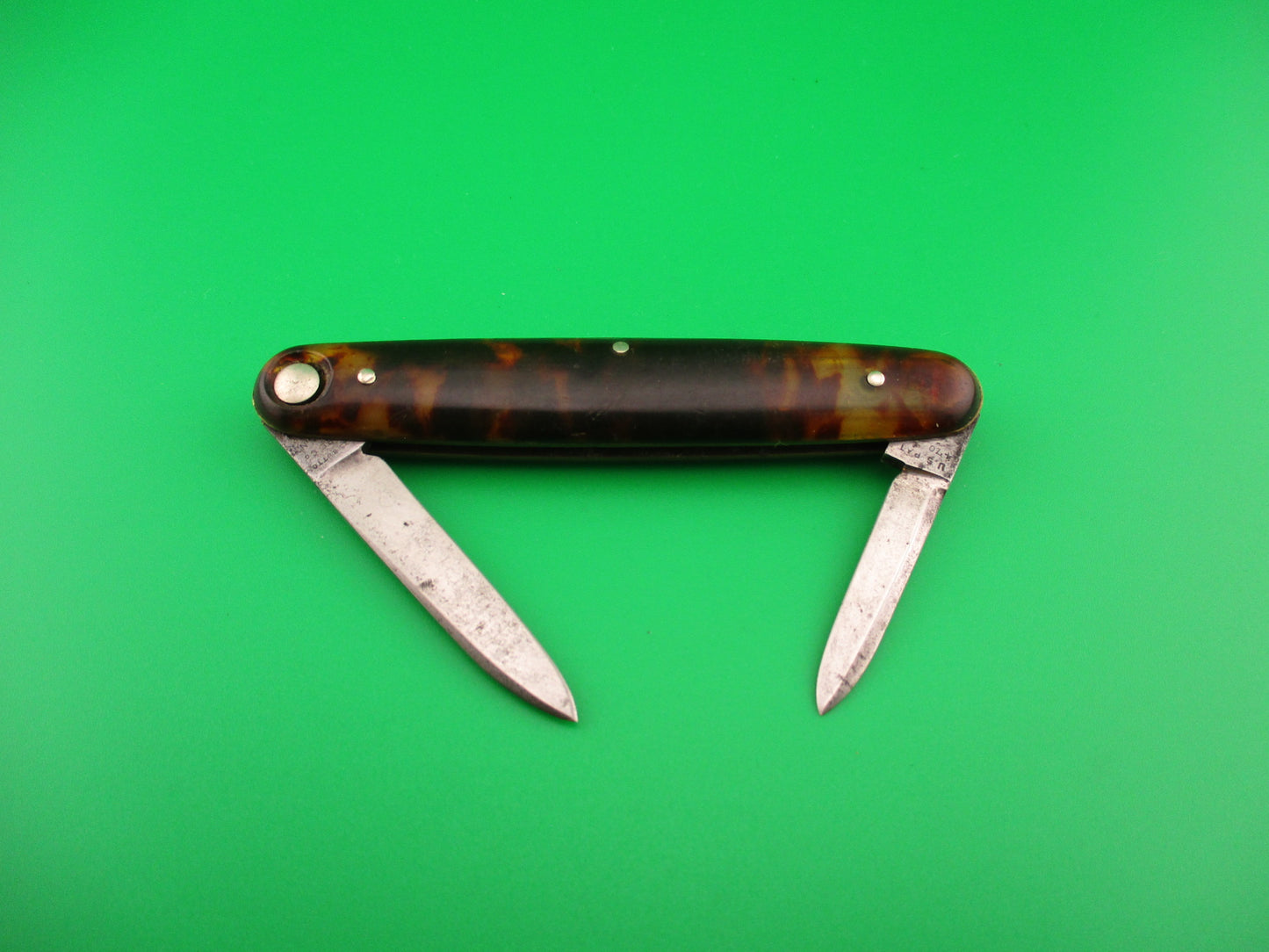 Press Button Knife Co #102 medium double Tortoise celluloid automatic knife