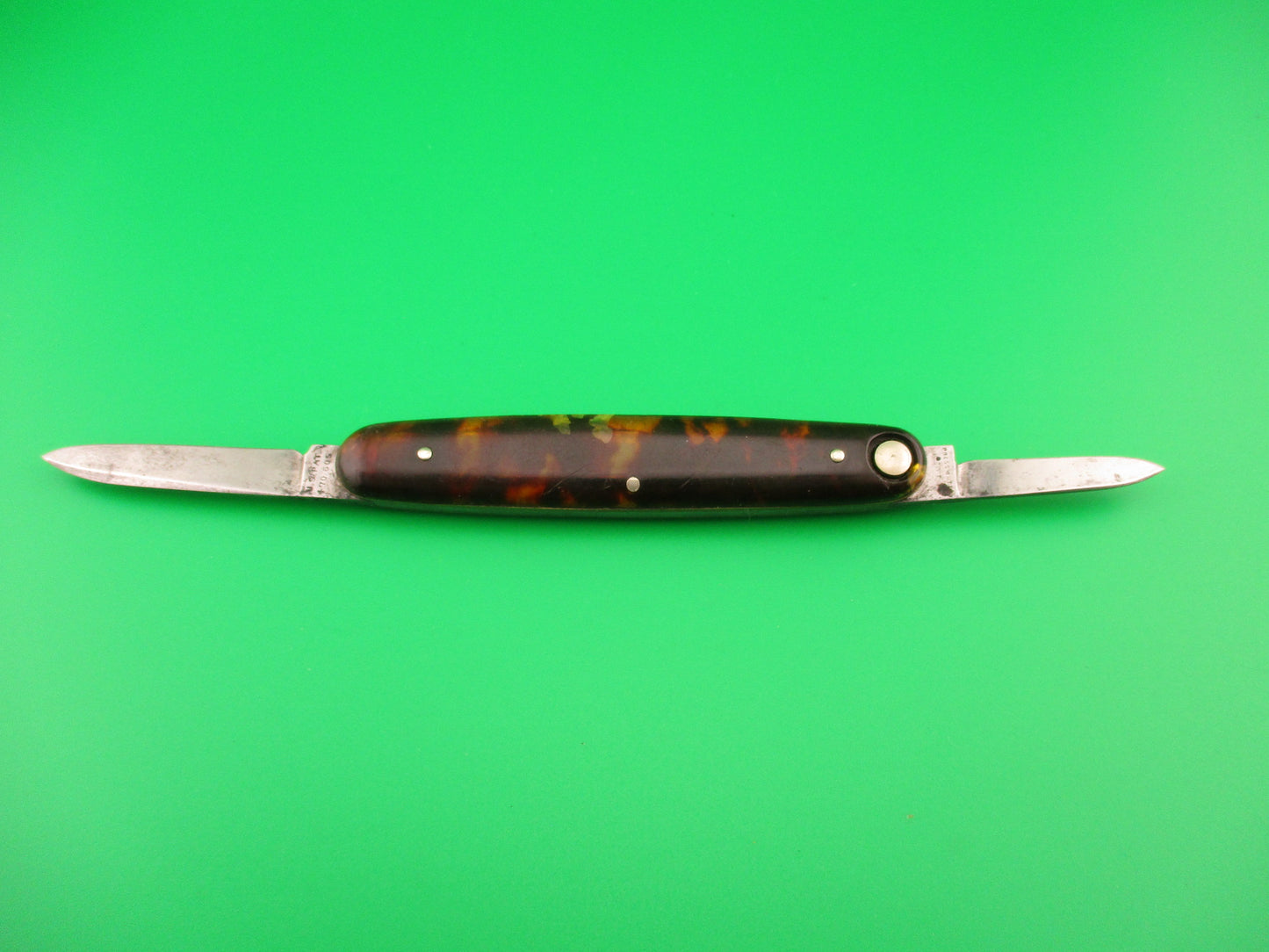 Press Button Knife Co #102 medium double Tortoise celluloid automatic knife
