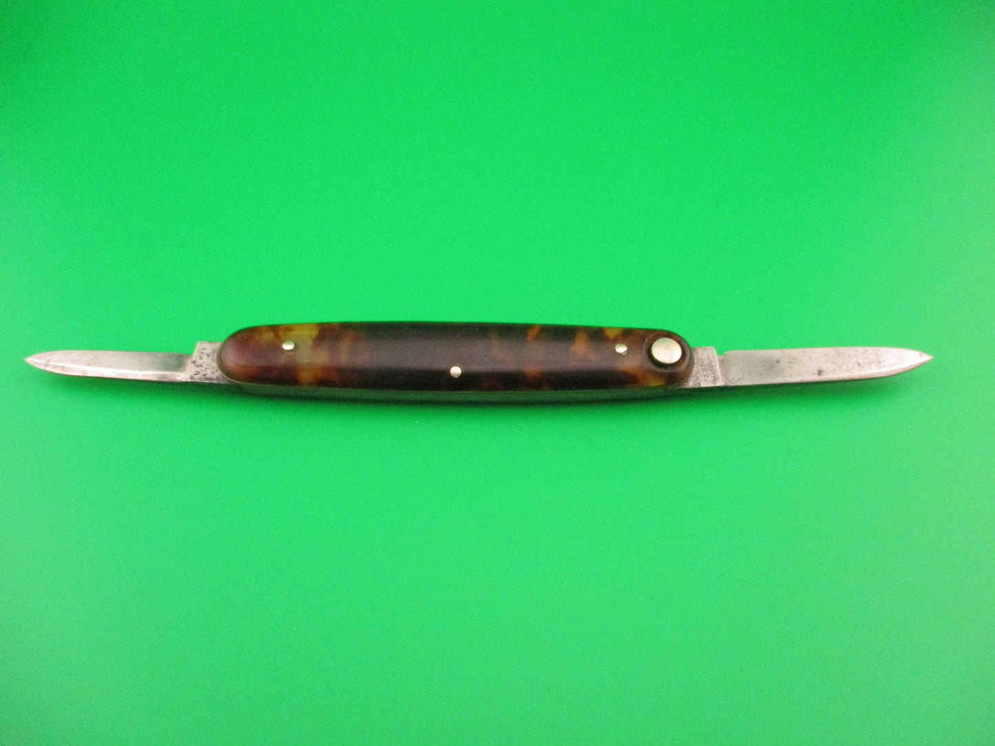 Press Button Knife Co #102 medium double Tortoise celluloid automatic knife