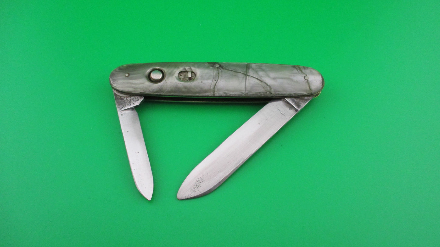 z Schrade Cut Co Large Double Smoked Pearl switchblade knife