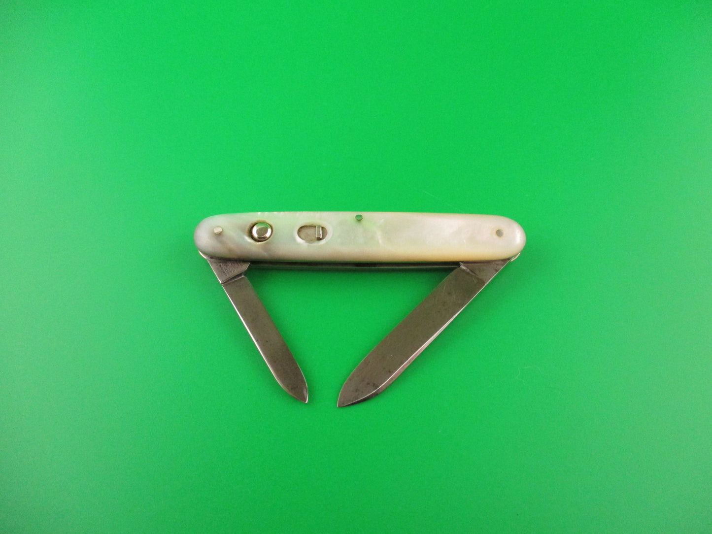 E. WECK & Son 3 3/8" Medium Double Pearl vintage automatic knife made by Schrade
