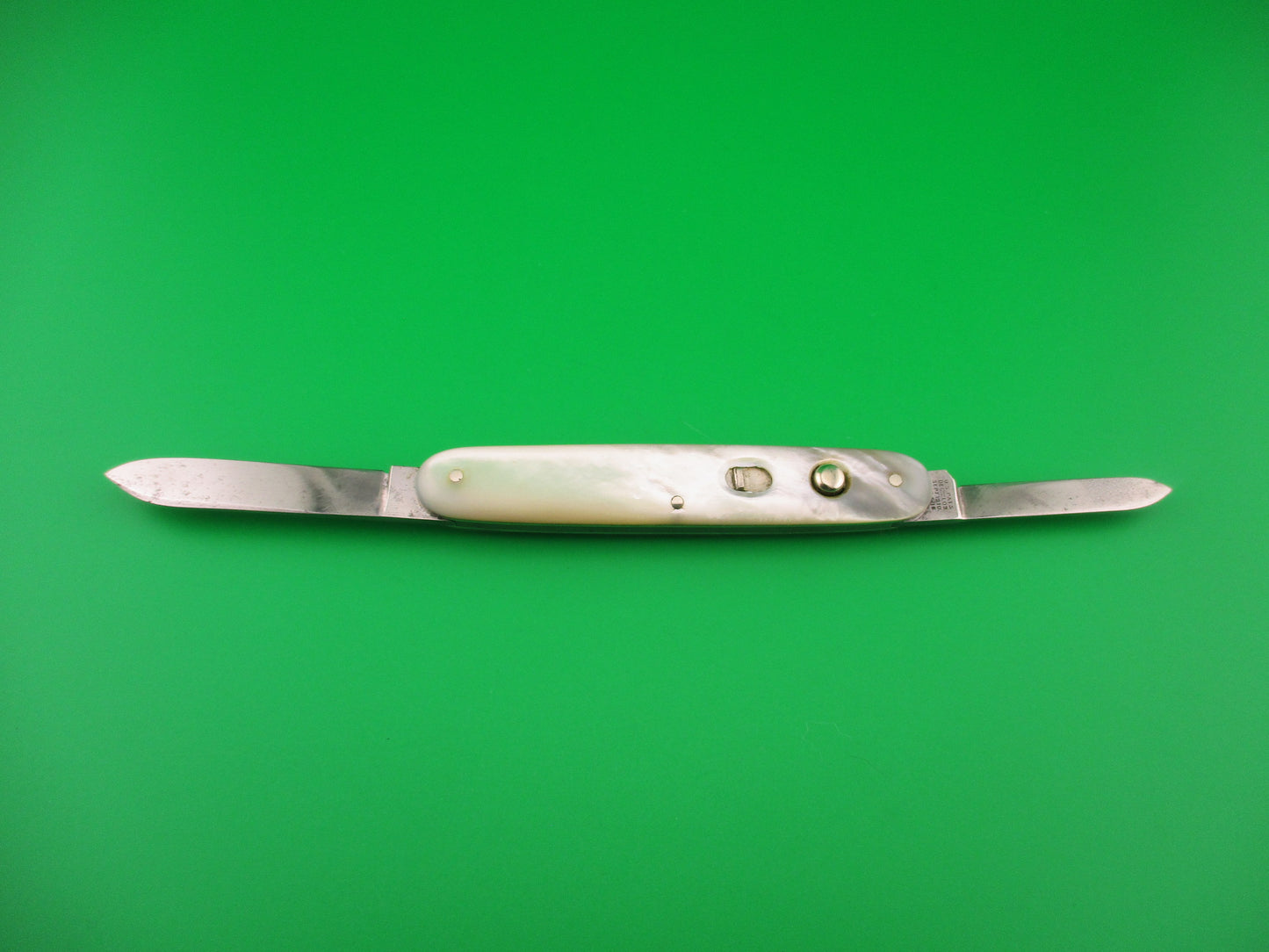 E. WECK & Son 3 3/8" Medium Double Pearl vintage automatic knife made by Schrade