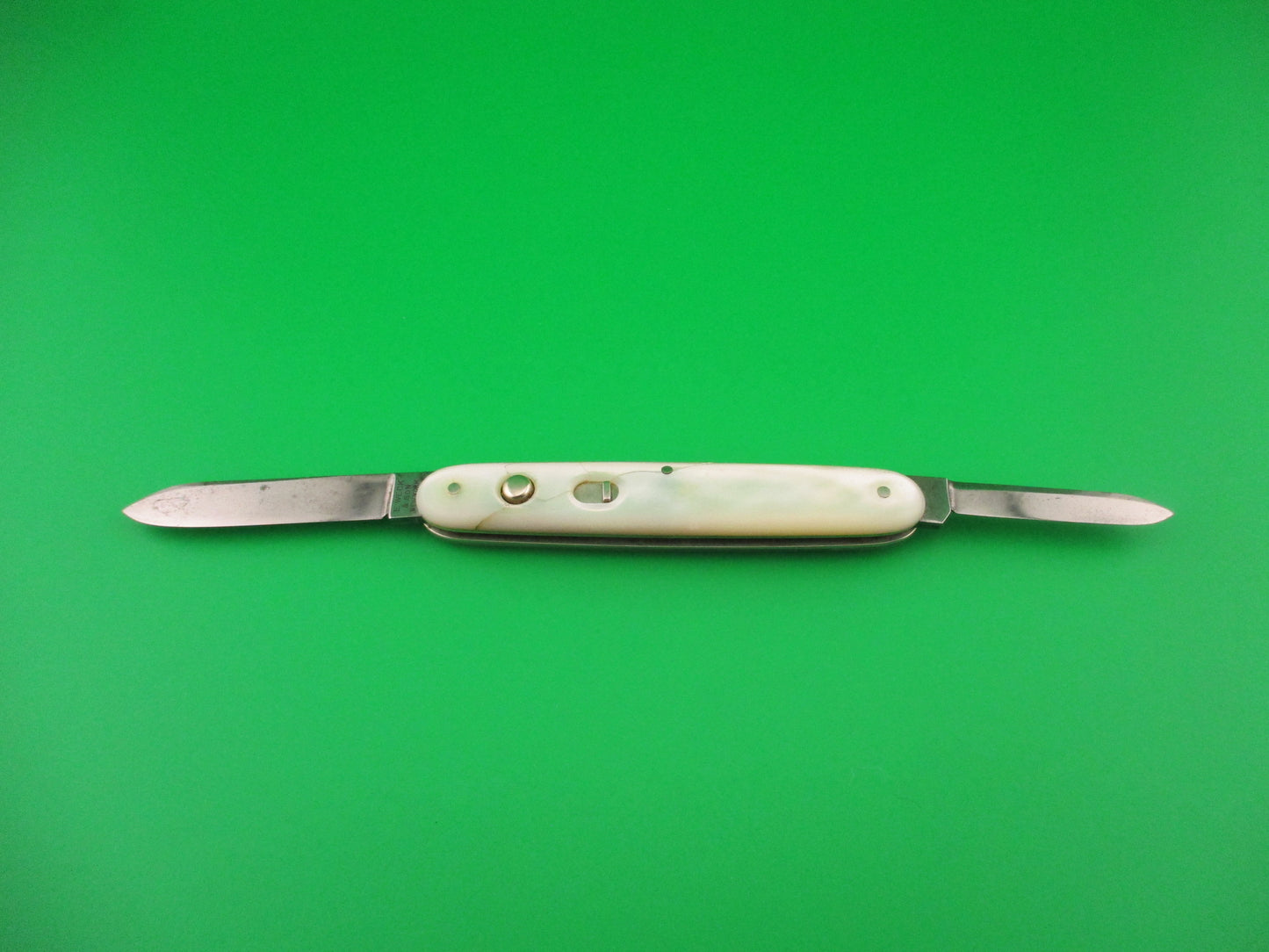 E. WECK & Son 3 3/8" Medium Double Pearl vintage automatic knife made by Schrade