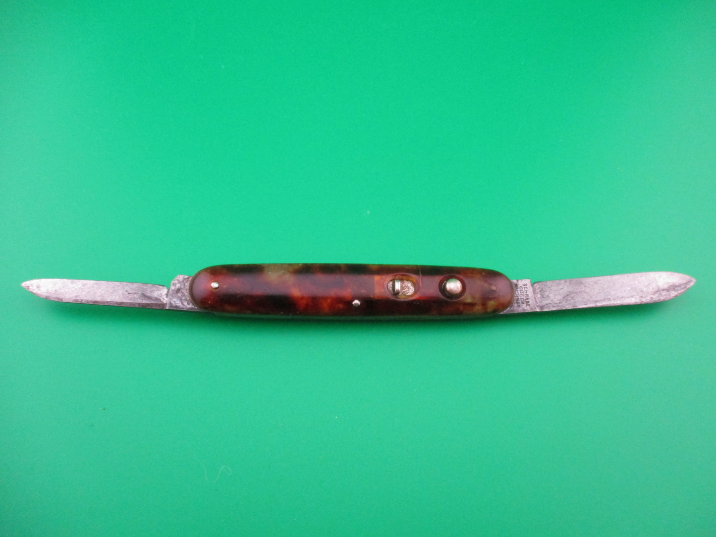 Schrade Cut Co medium double Tortoise celluloid early