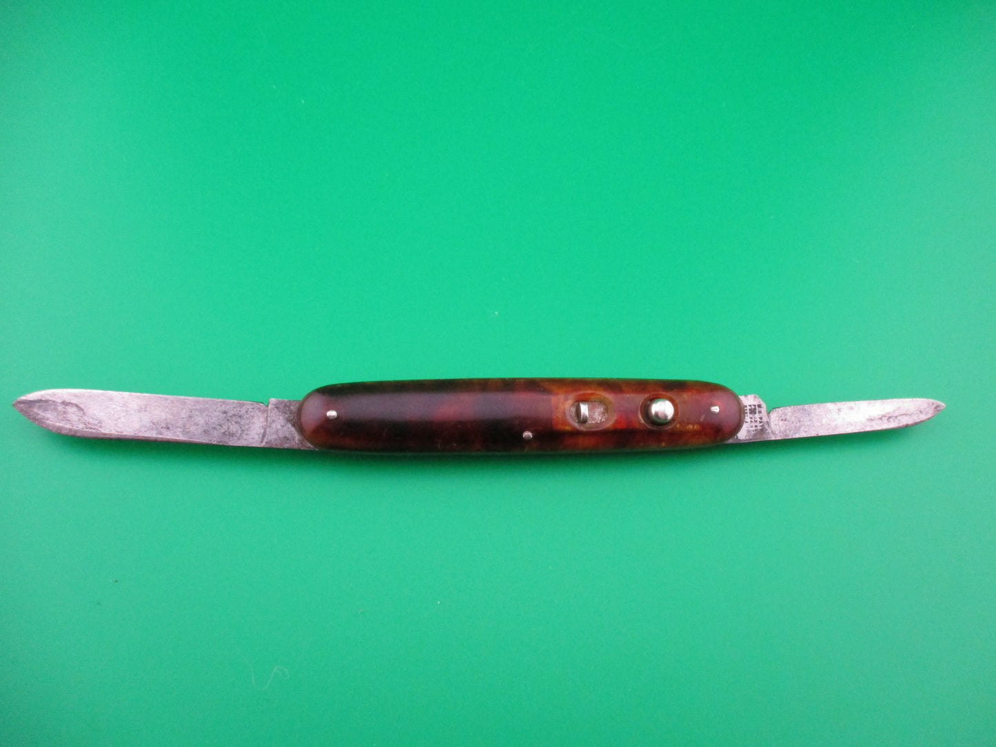 Schrade Cut Co medium double Tortoise celluloid early