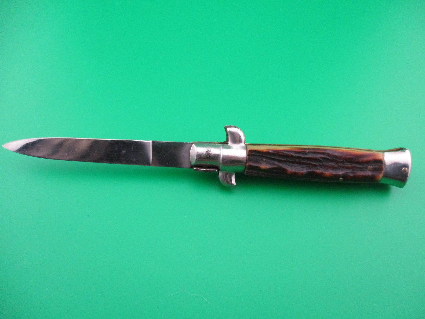 z ROSTFREI Italian 7 inch stag swivel bolster automatic knife