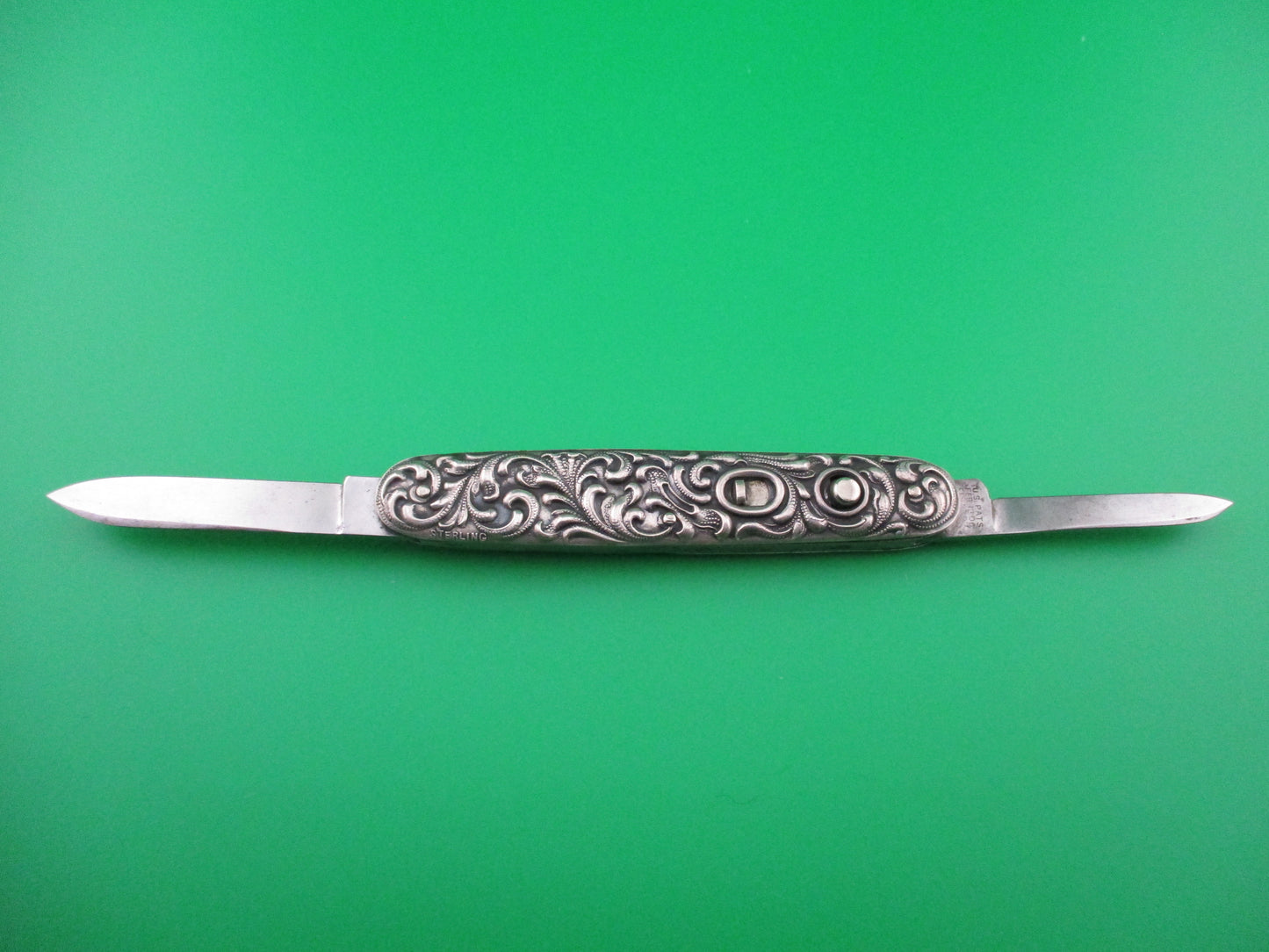 z Schrade Cut Co 3 3/8 inch Sterling double scroll