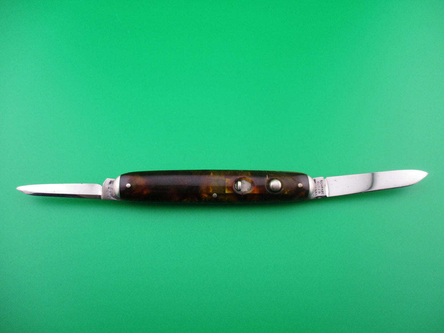 Schrade Cut Co Tortoise cell medium double switchblade