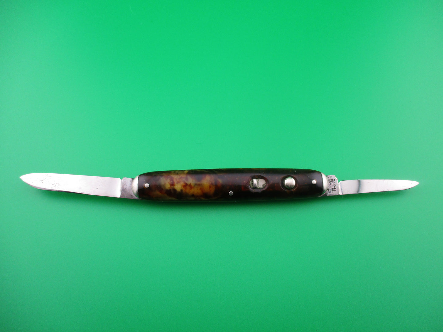 Schrade Cut Co Tortoise cell medium double switchblade