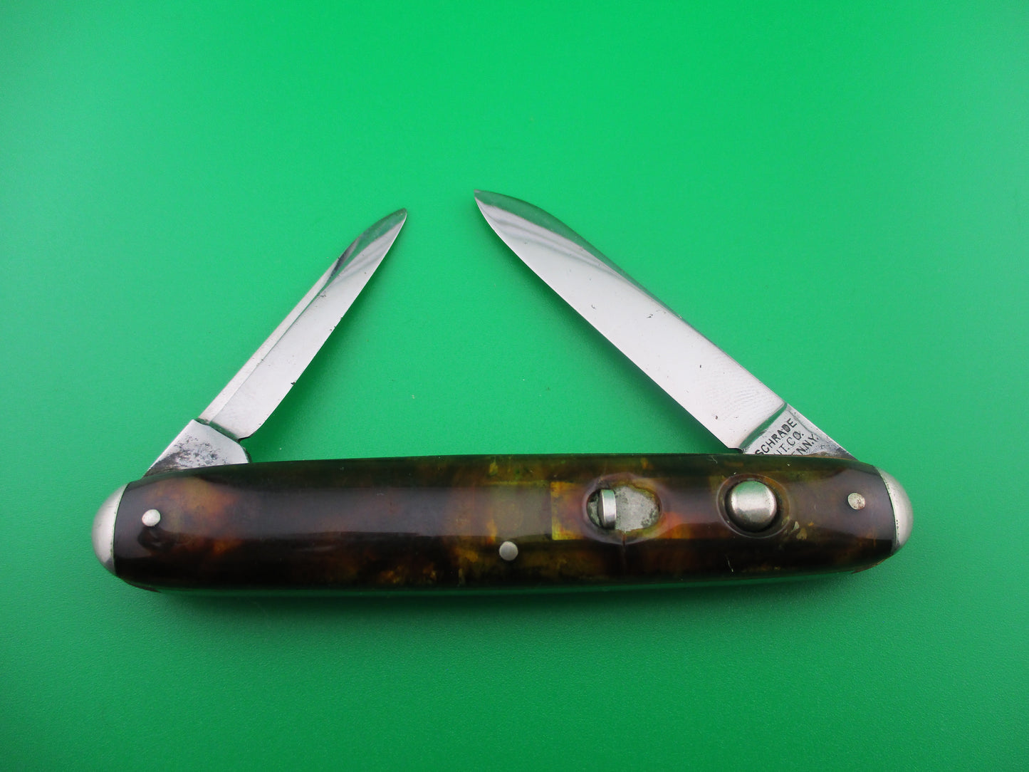 Schrade Cut Co Tortoise cell medium double switchblade