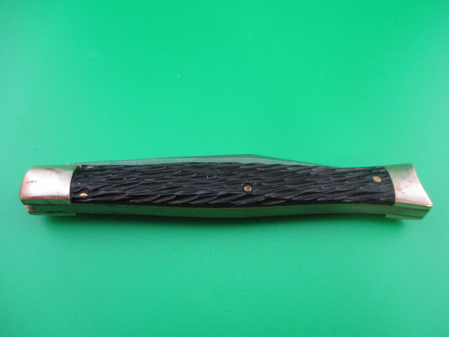 Schrade Walden Fishtail Black jigged bolsters