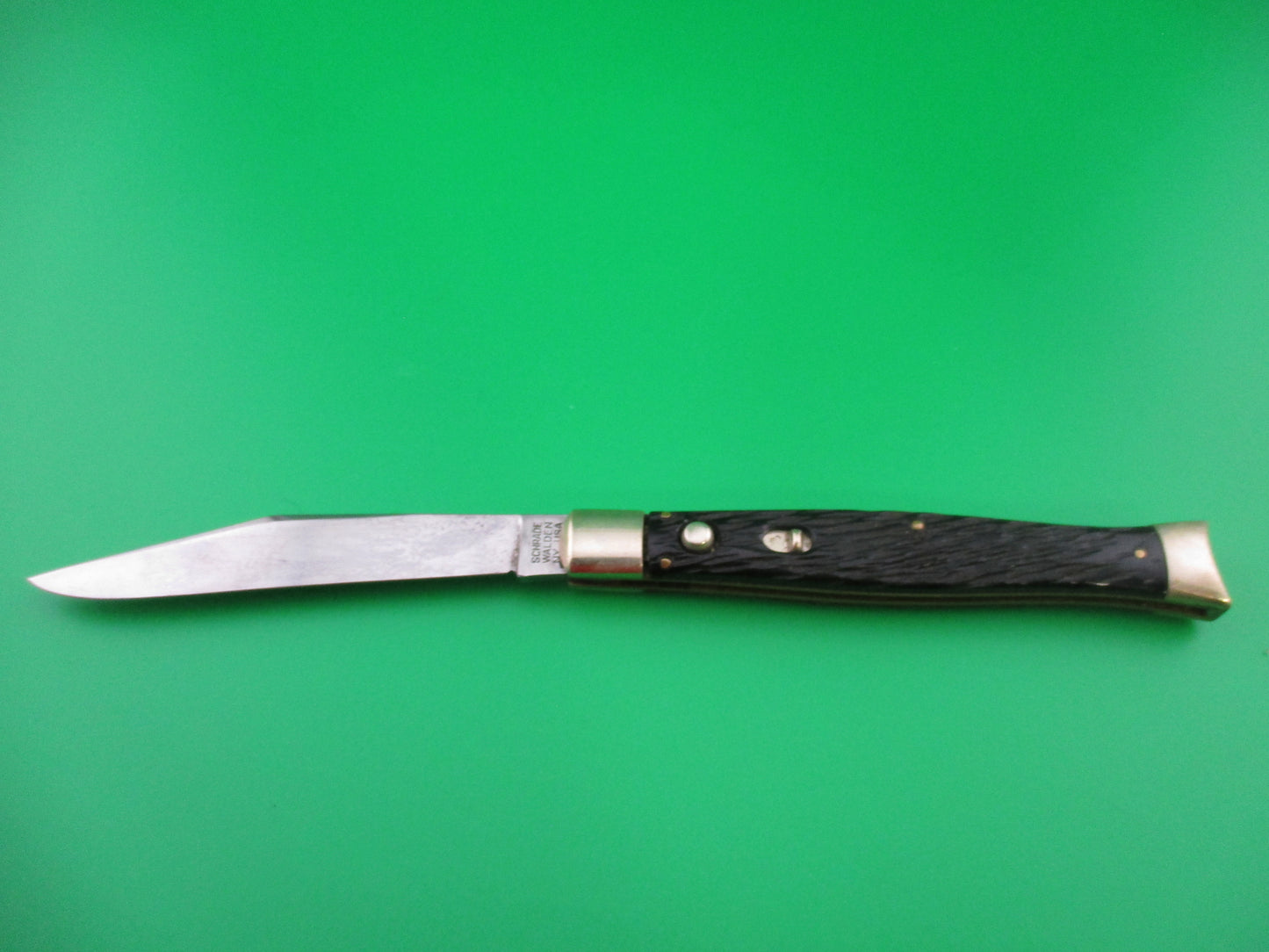 Schrade Walden Fishtail Black jigged bolsters