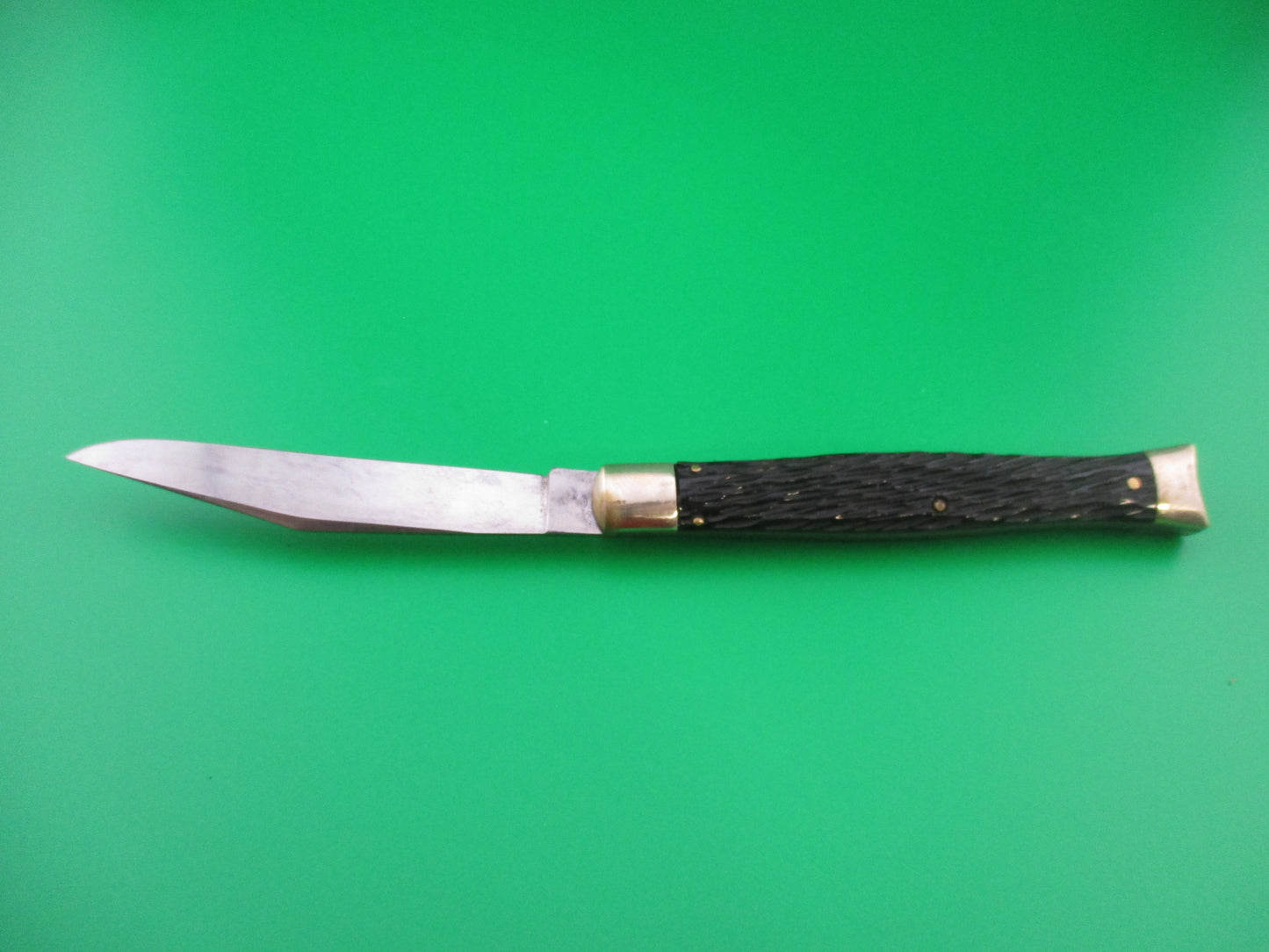Schrade Walden Fishtail Black jigged bolsters