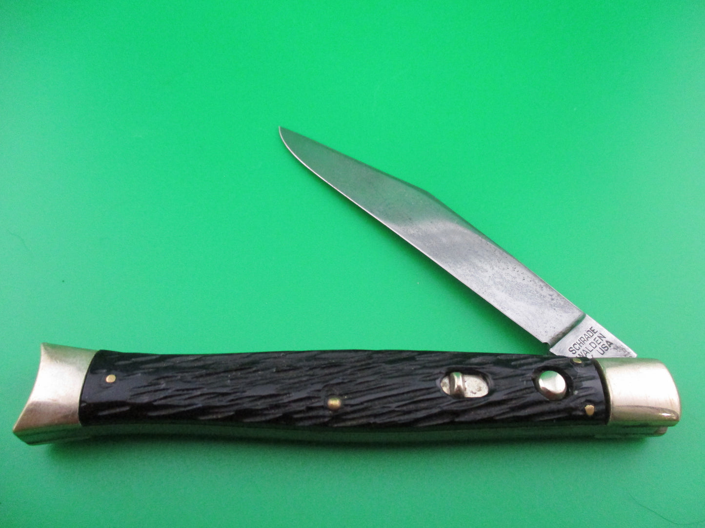Schrade Walden Fishtail Black jigged bolsters