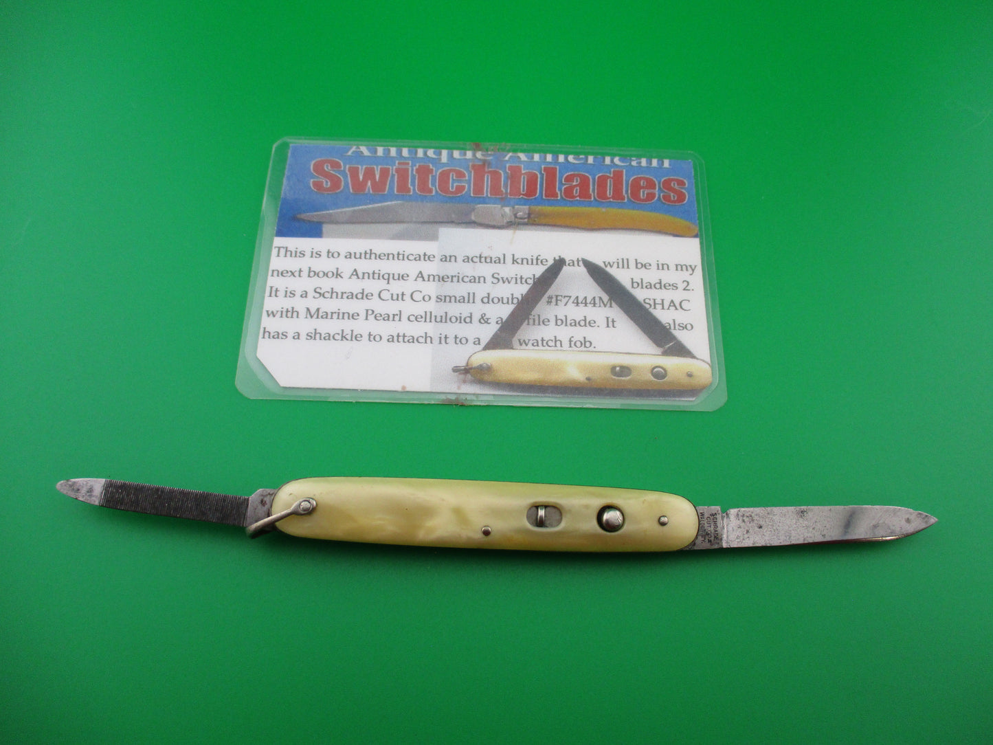 z Schrade Cut Co Marine Pearl small double w shackle & file blade