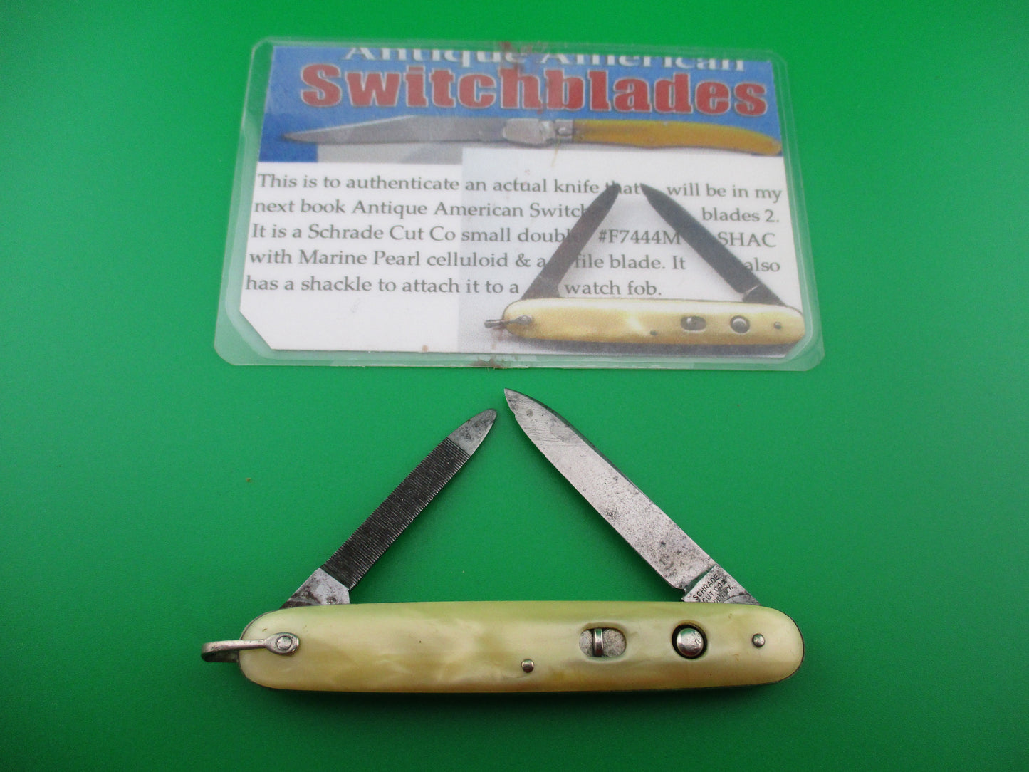 z Schrade Cut Co Marine Pearl small double w shackle & file blade