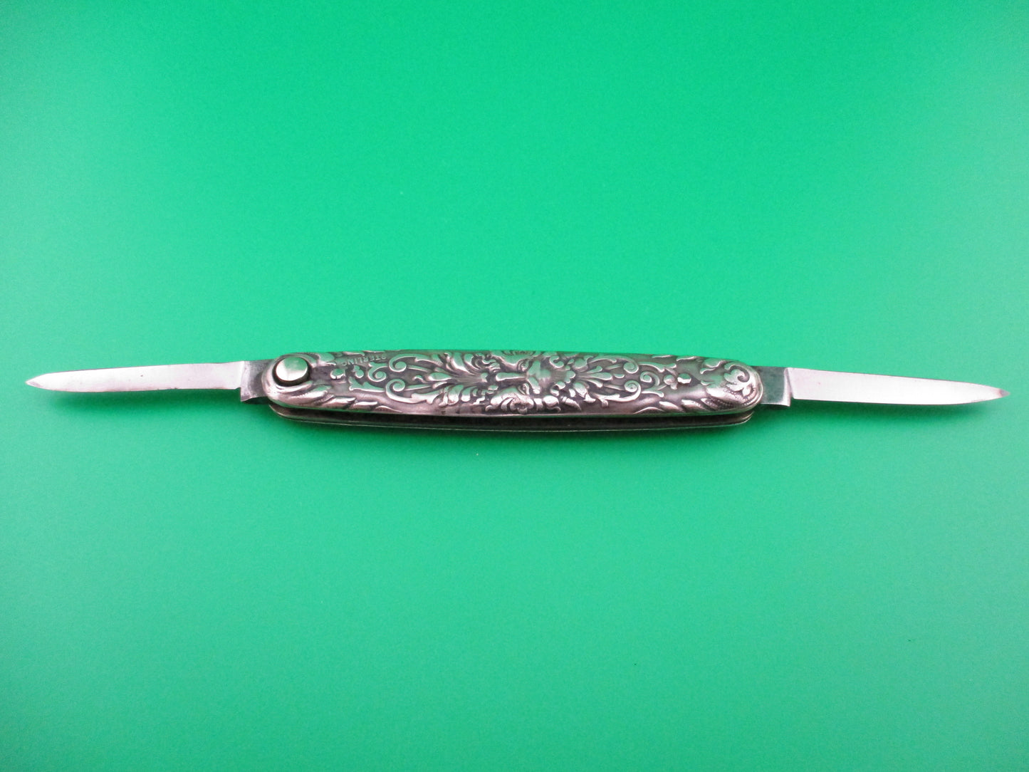 z Press Button Knife Co medium Sterling Silver Satyr double switchblade