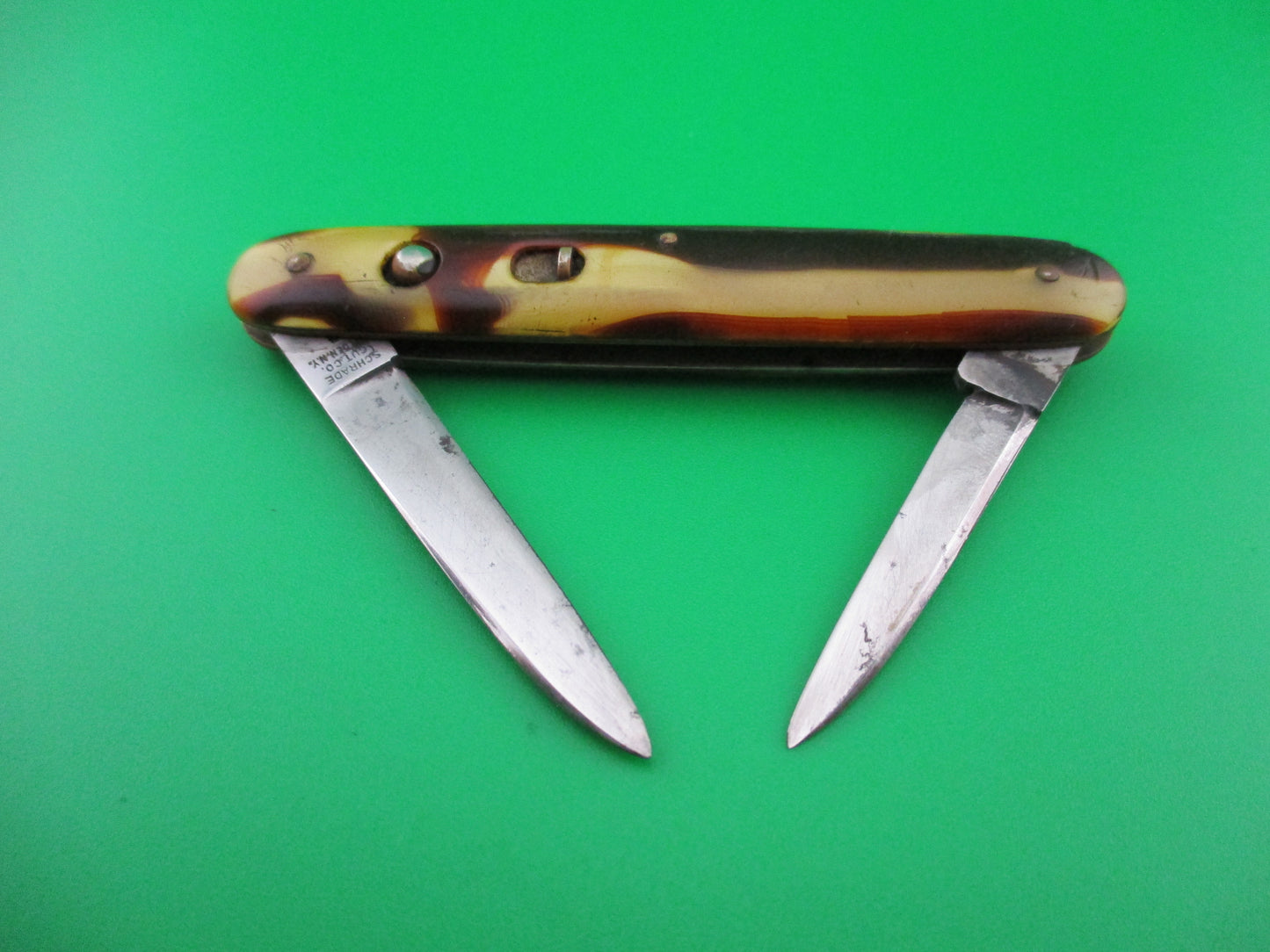 z Schrade Cut Co small double Butter & Molasses cell switchblade knife
