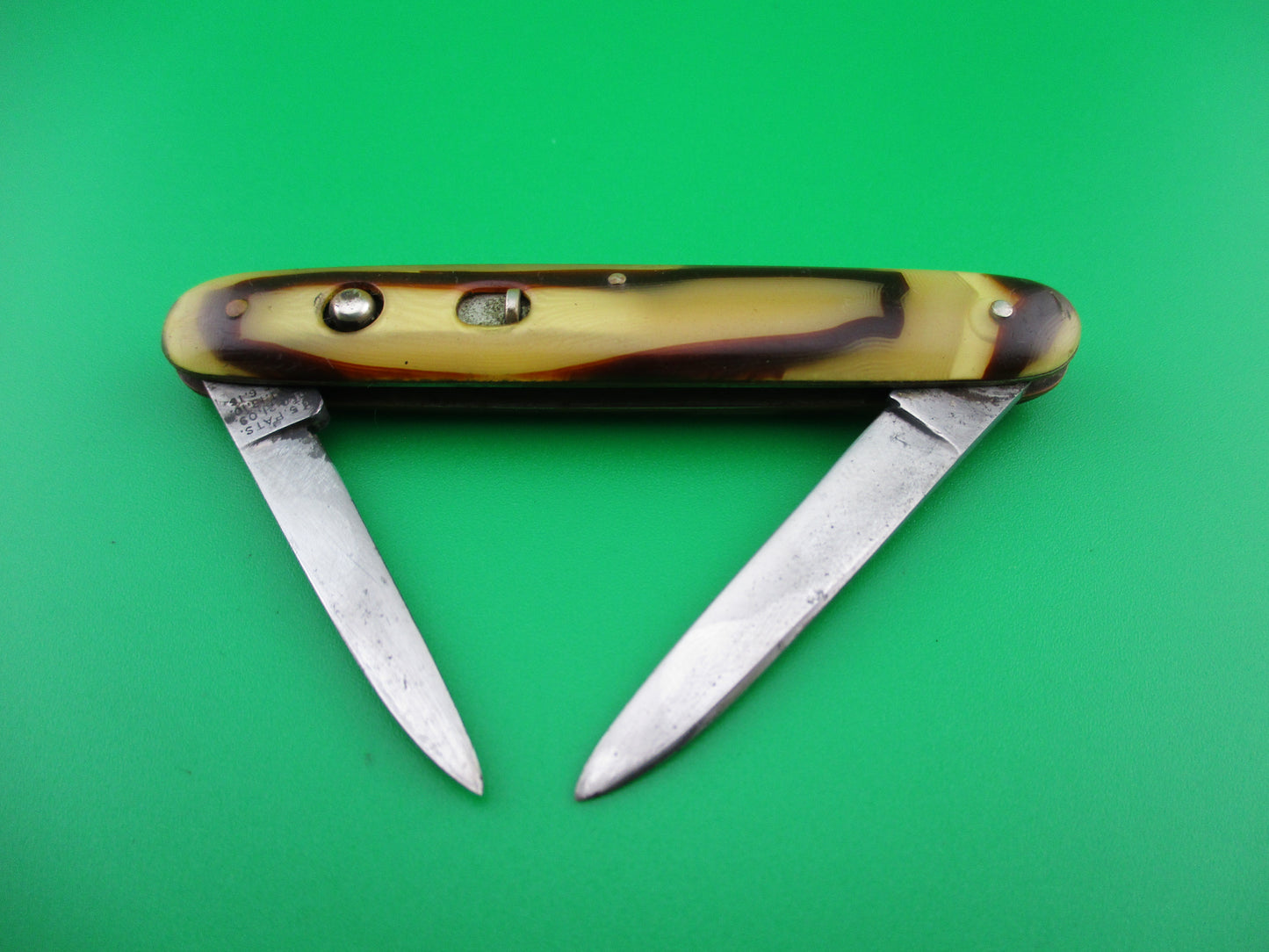z Schrade Cut Co small double Butter & Molasses cell switchblade knife