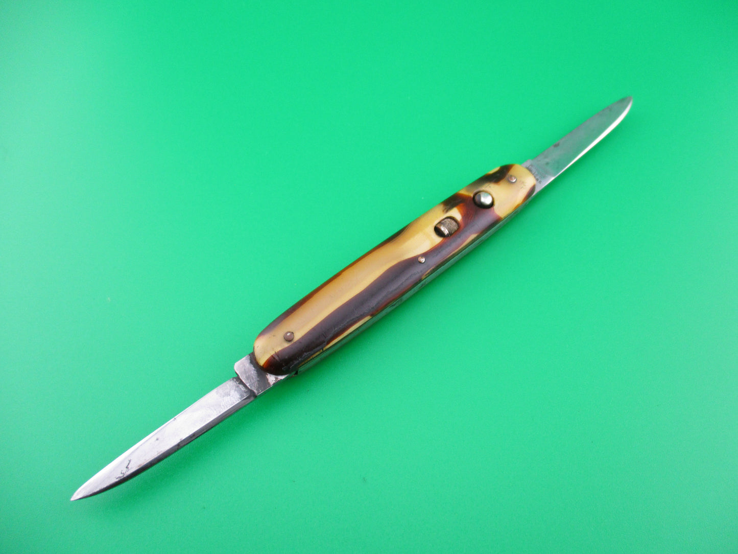 z Schrade Cut Co small double Butter & Molasses cell switchblade knife