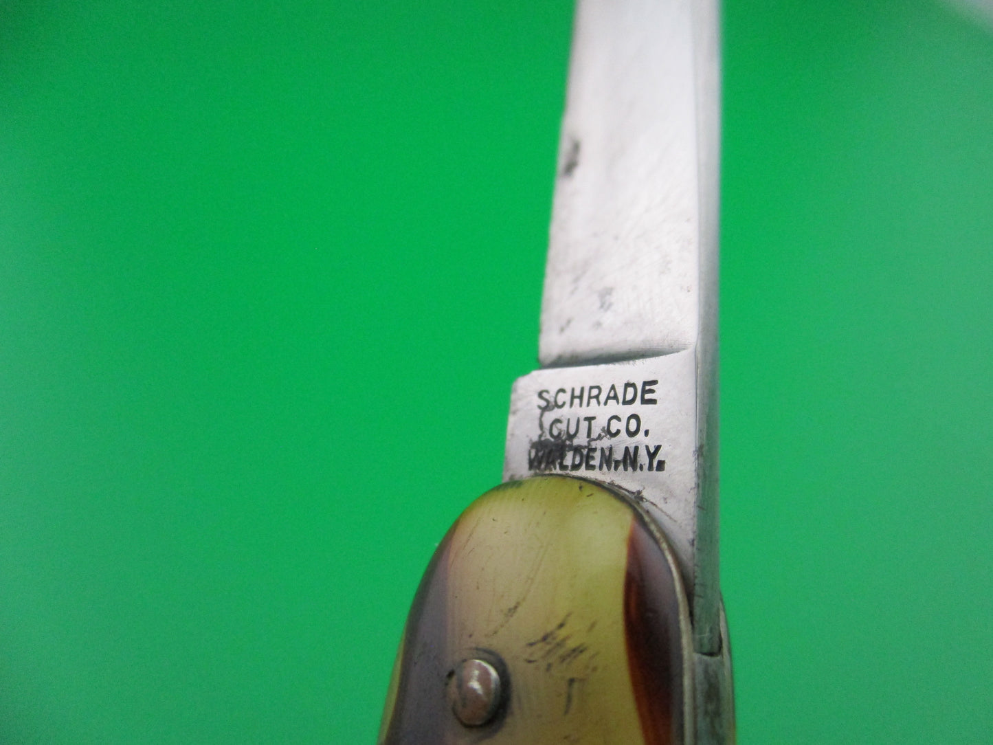 z Schrade Cut Co small double Butter & Molasses cell switchblade knife