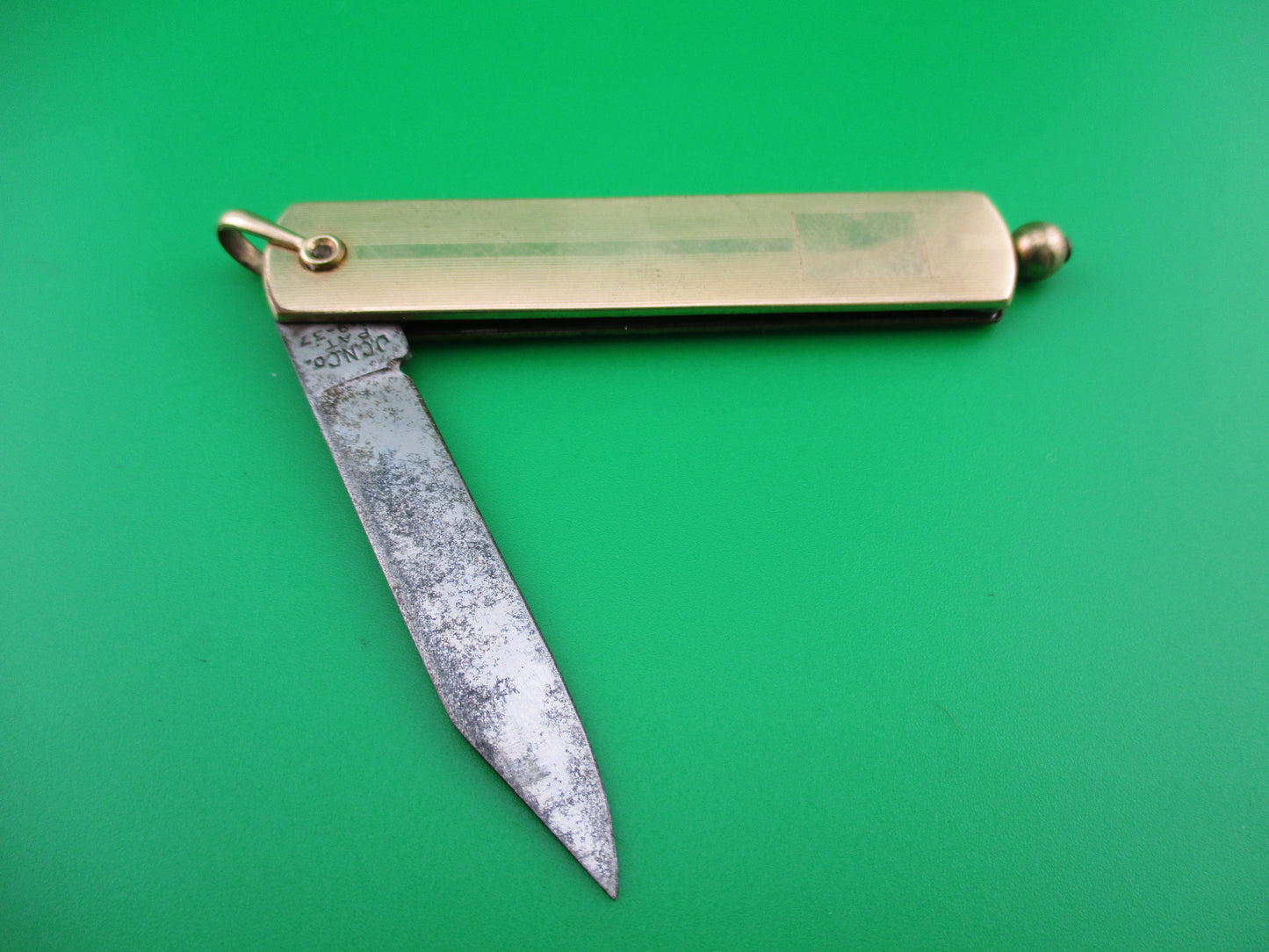 JCN Co 12 Karat Gold filled Pullball switchblade knife