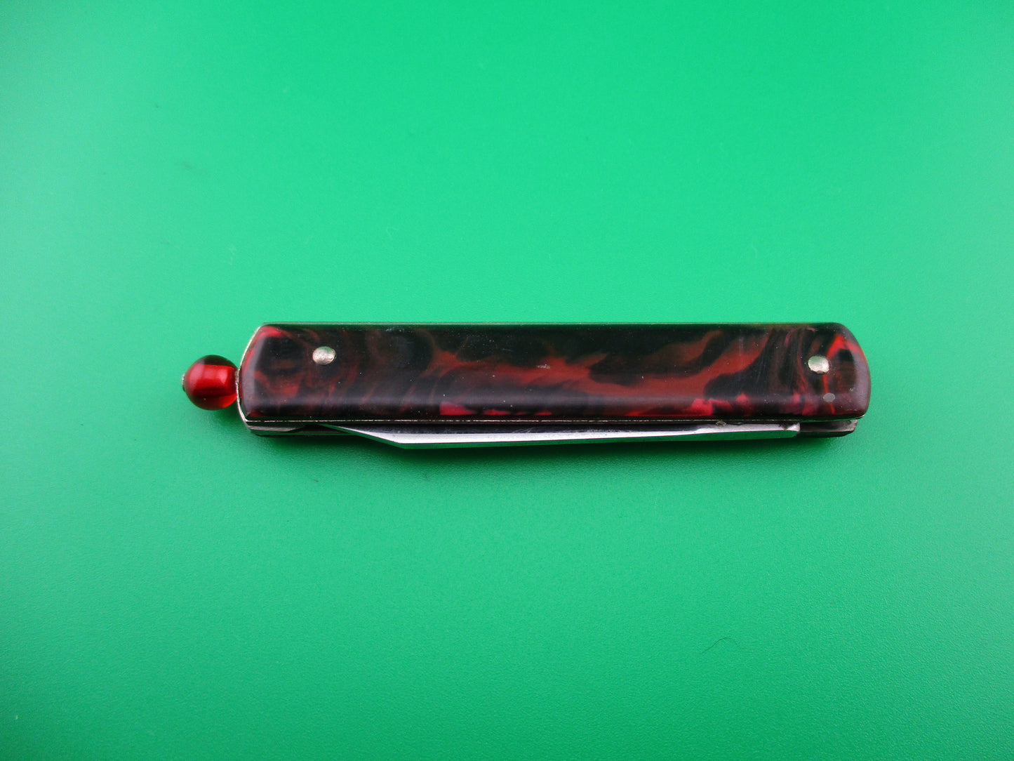 GEORGE SCHRADE KNIFE CO Pullball Red swirl switchblade knife w/sheath
