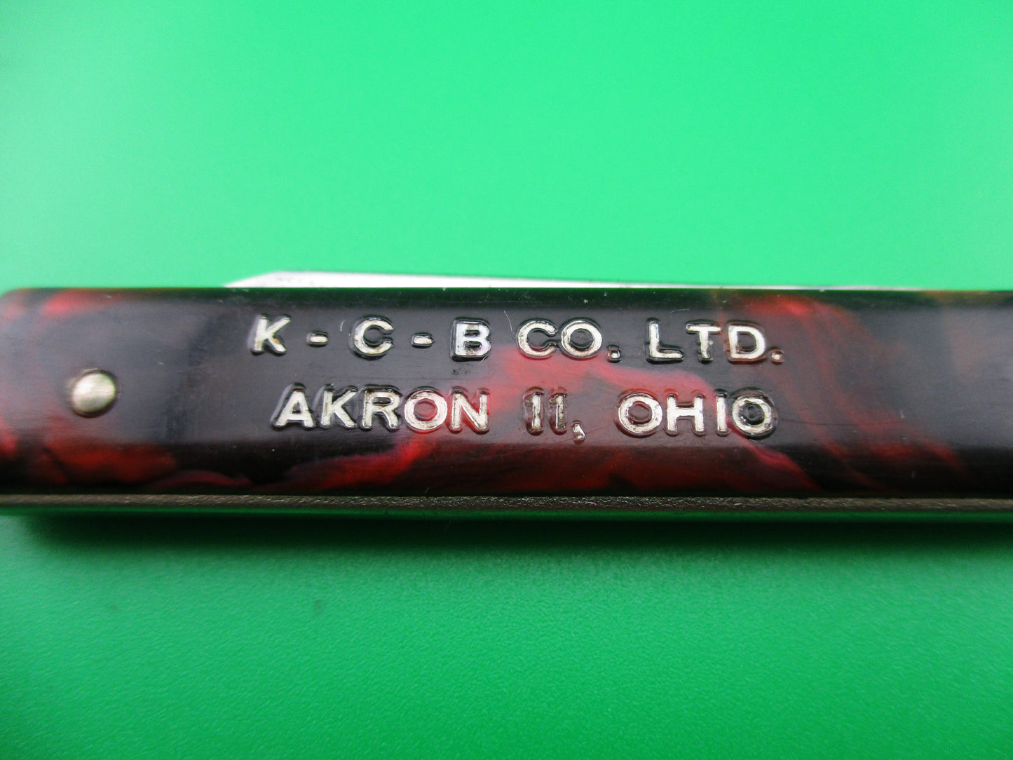 GEORGE SCHRADE KNIFE CO Pullball Red swirl switchblade knife w/sheath