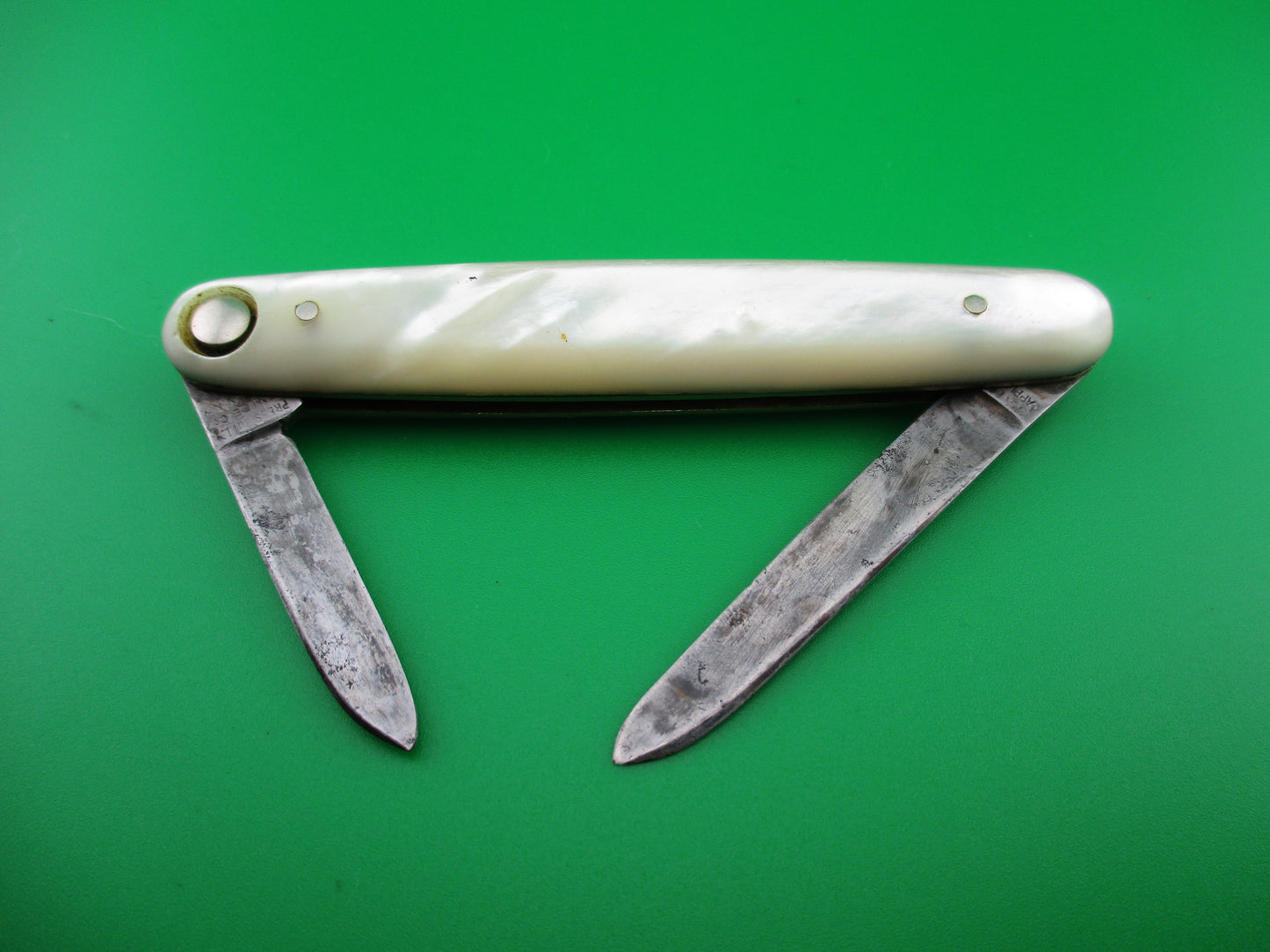 Press Button Knife Co medium double MOP switchblade knife