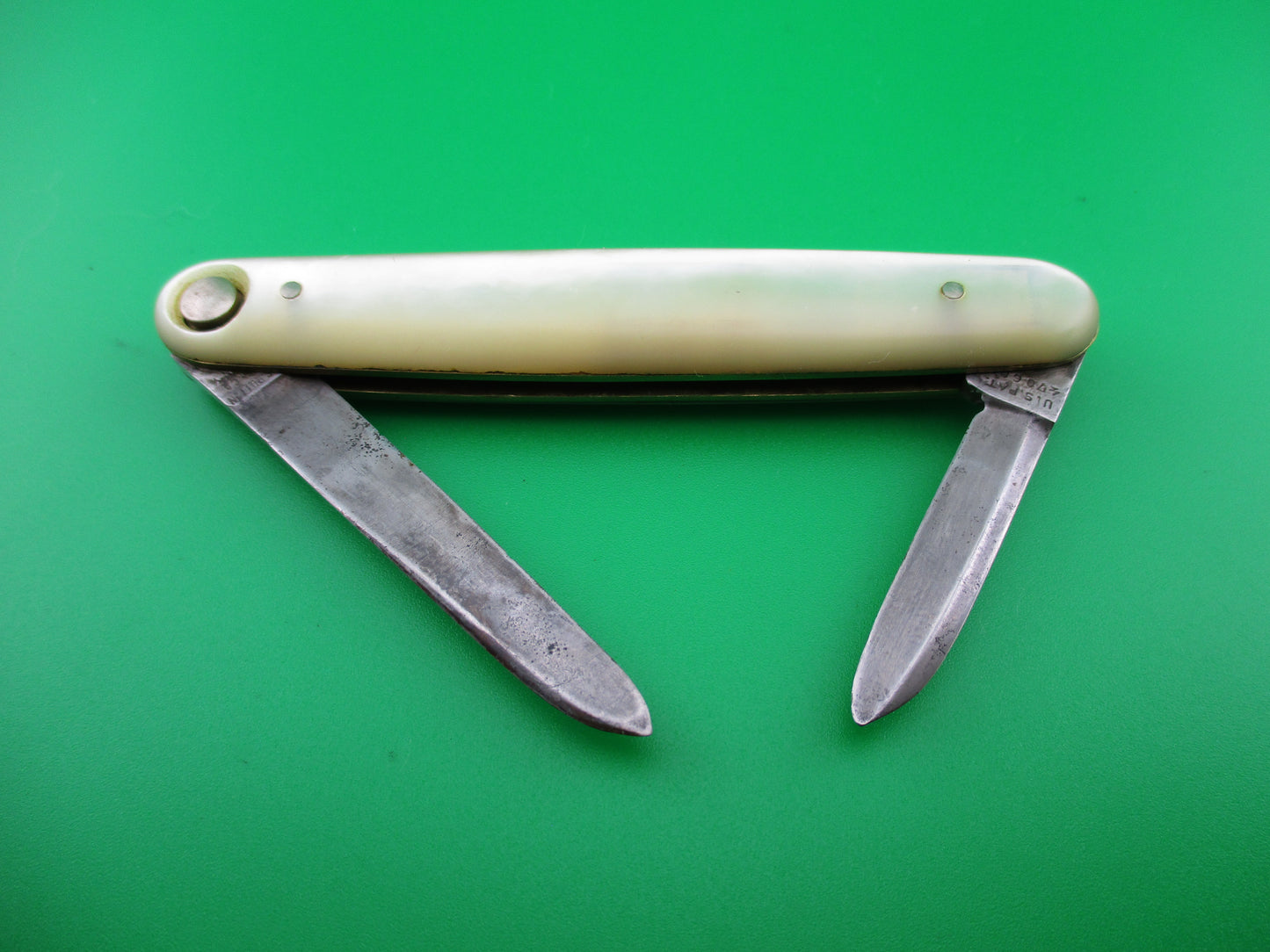 Press Button Knife Co medium double MOP switchblade knife
