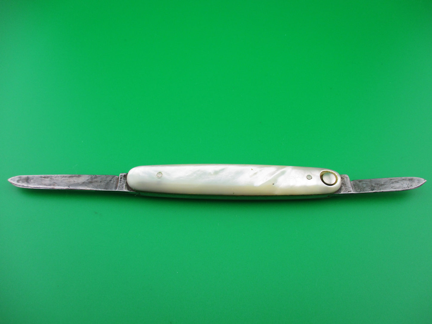 Press Button Knife Co medium double MOP switchblade knife