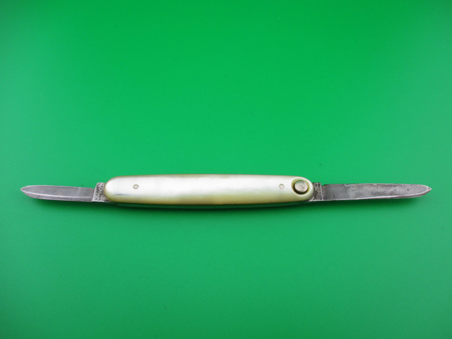 Press Button Knife Co medium double MOP switchblade knife