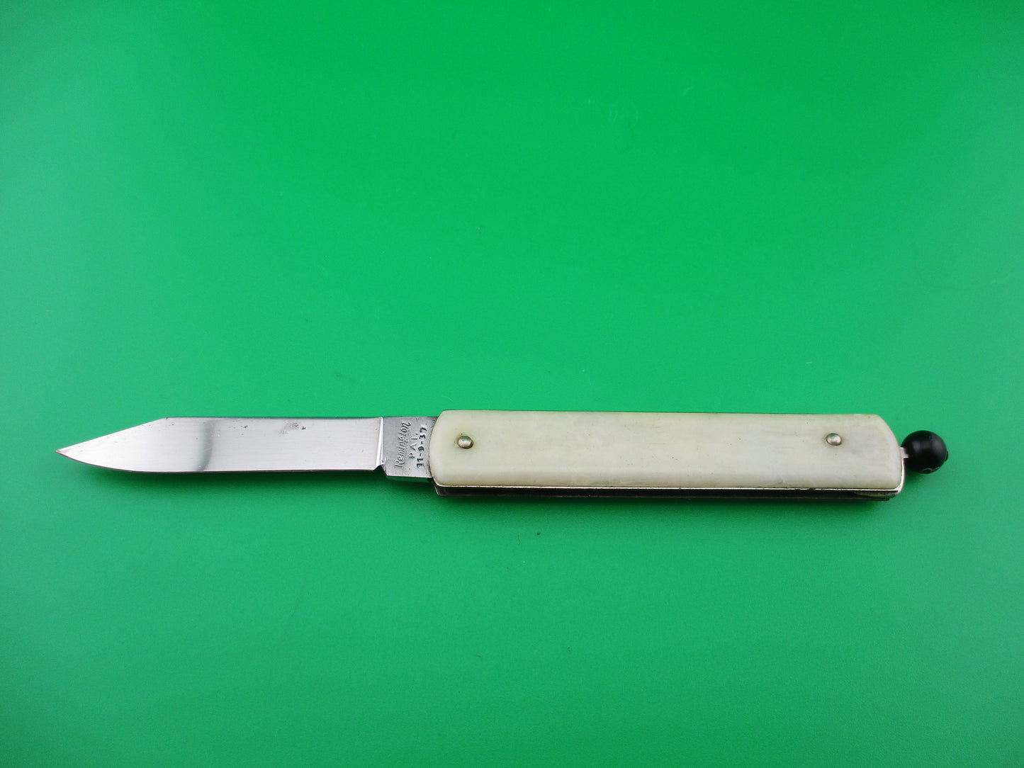 z Remington R17 Pullball Hi-Speed Gas advertising automatic knife